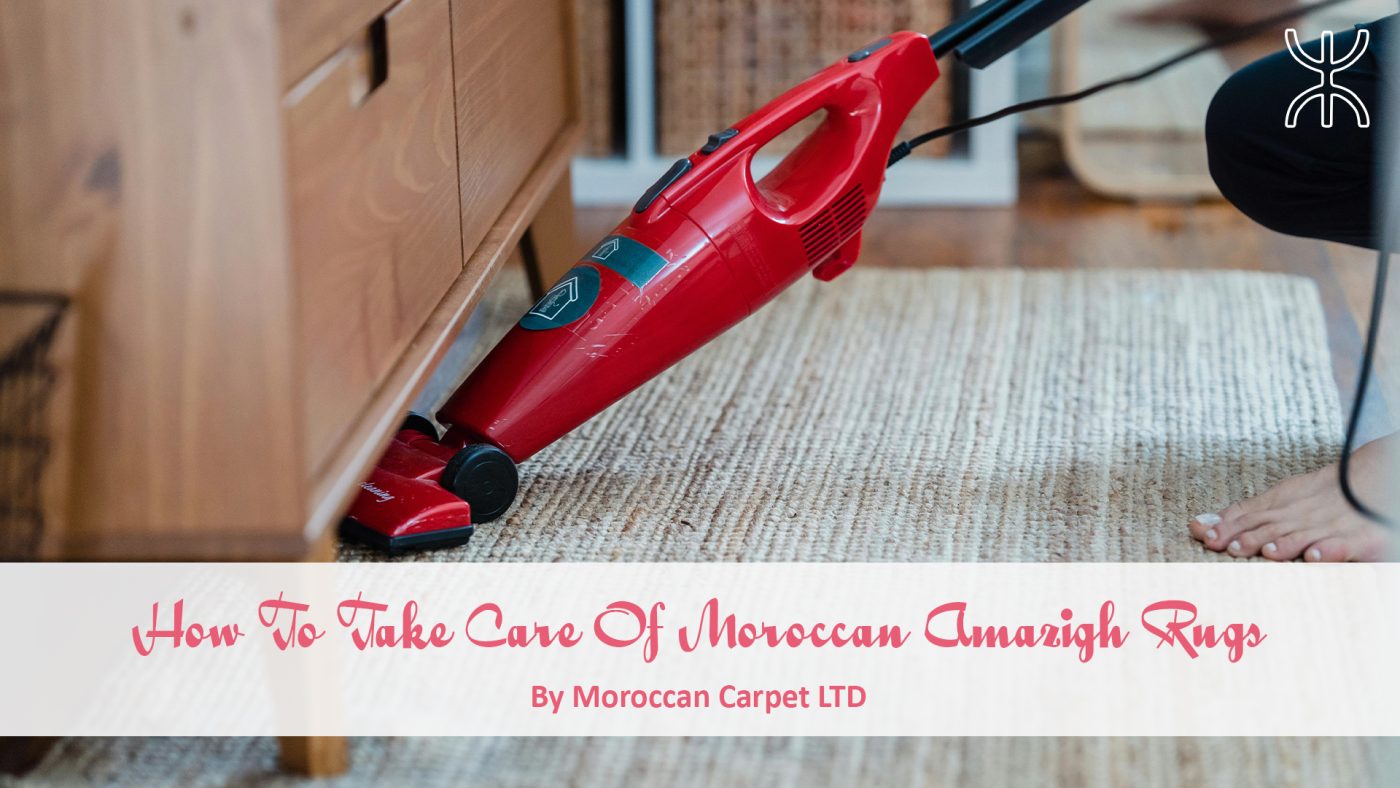 a woman is using a vacuum cleaner on the floor. 09 – How To Take Care Of Moroccan Amazigh Rugs 01