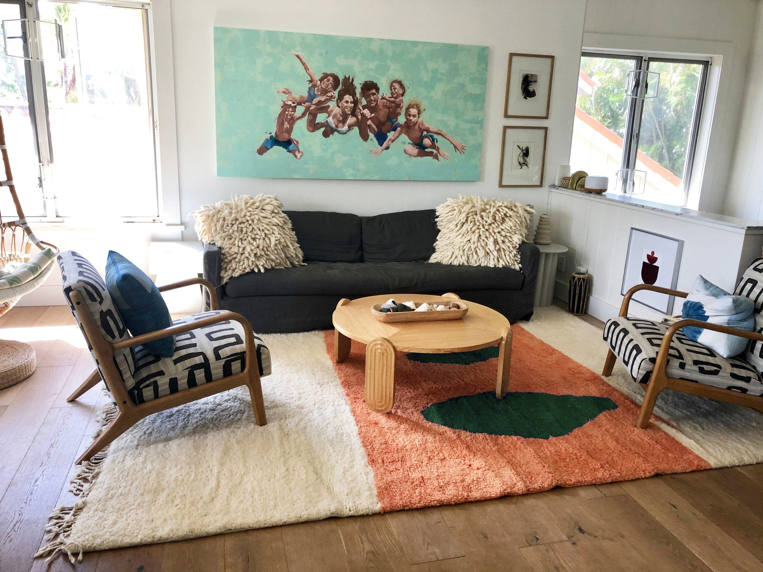 a living room with a couch, chair, and coffee table. 002 – VIN00C_W-40_OR-24_GR-10