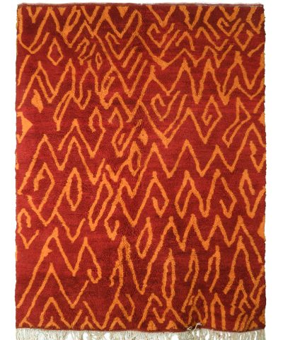 a red and orange rug with fringes. STC_001_303-204_RD_OR (1.1)