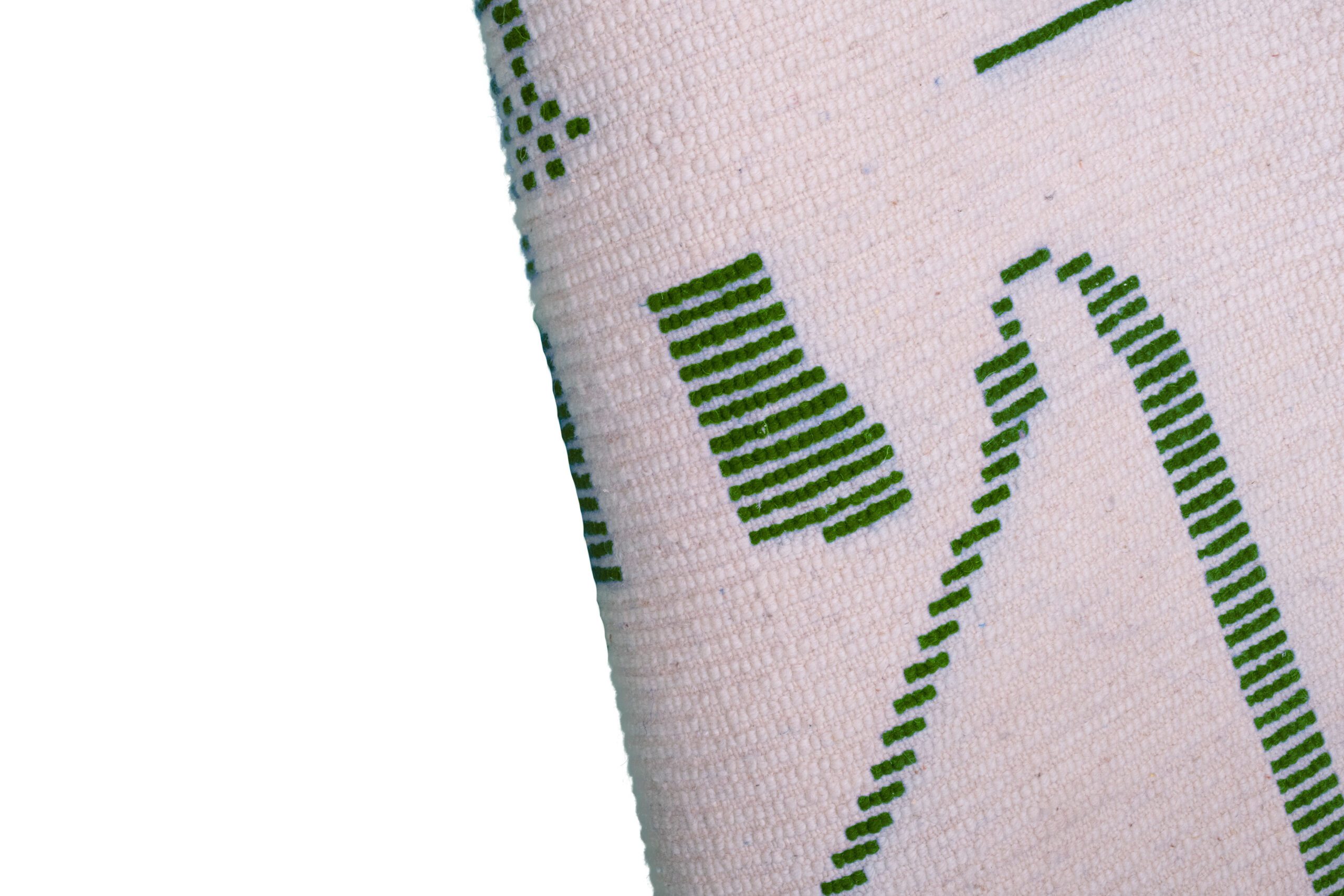 a close up of a white sock with green stripes. VINA073 W-40_GR-10 (9)