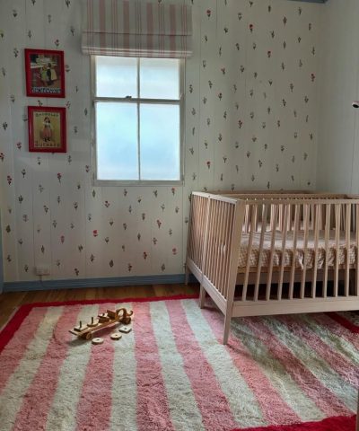 a baby ' s room with a cribe and a cribe. WhatsApp Image 2024-12-09 at 19.16.05