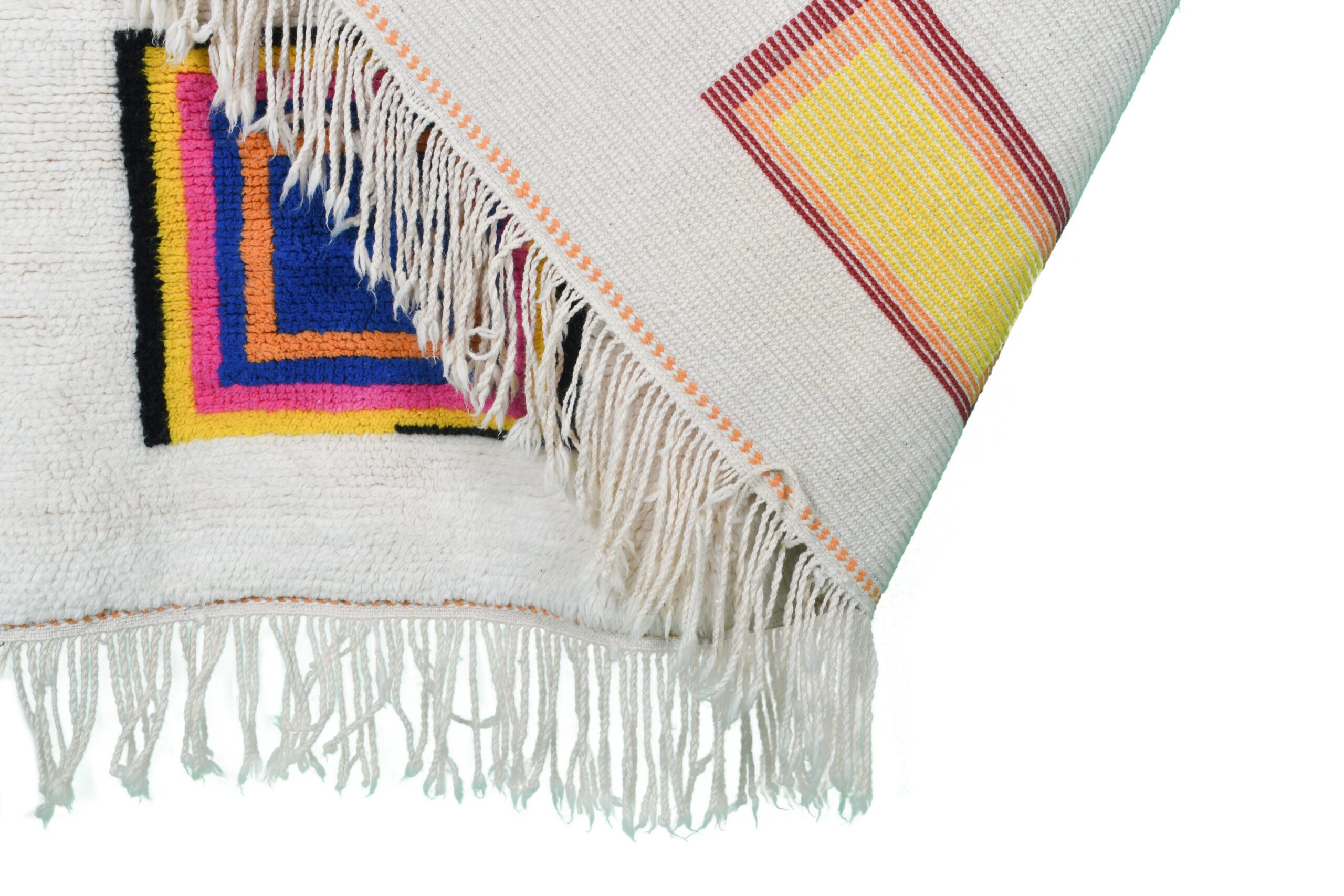 a white moroccan rug with a colorful design on it. VIN0117_W-40_BL-05_BL-09_PN-92_PN-35_BK-39_GR-14_YL-15_OR-24_RD-17 (10)