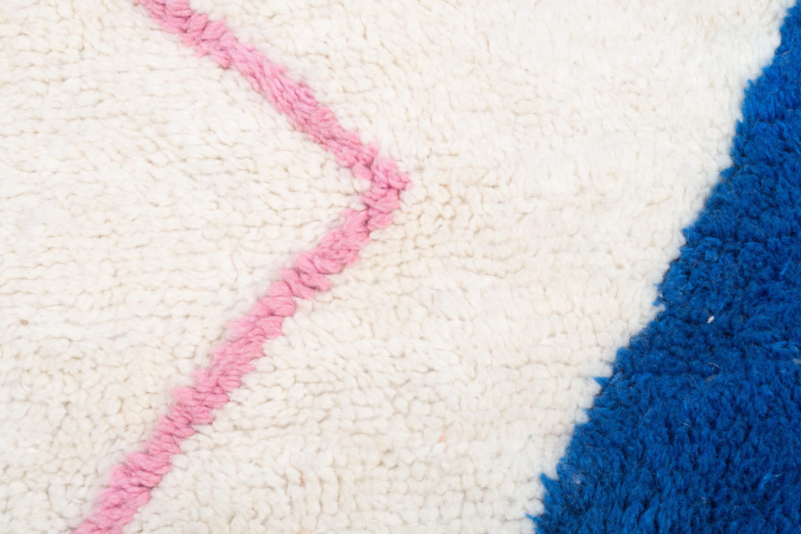 a close up of a rug with a pink and blue stripe. VIN071_W-40_OR-26_BL-03_PN-92 (7)