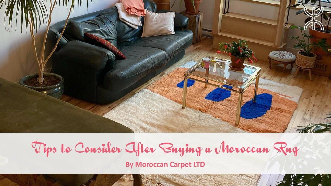 a living room with a couch and a coffee table. Tips to Consider After Buying a Moroccan Rug 01