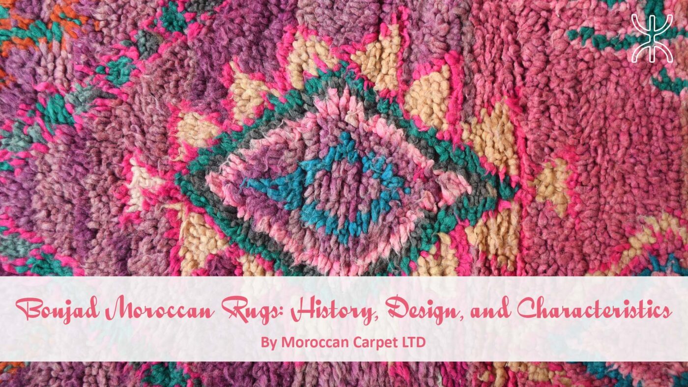 a close up of a pink and green rug with the words, ' sei mola '. Boujad Moroccan Rugs History, Design, and Characteristics