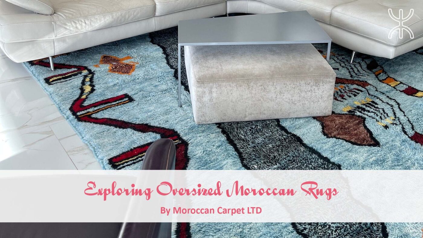 a living room with a couch and a rug. Exploring Oversized Moroccan Rugs 01