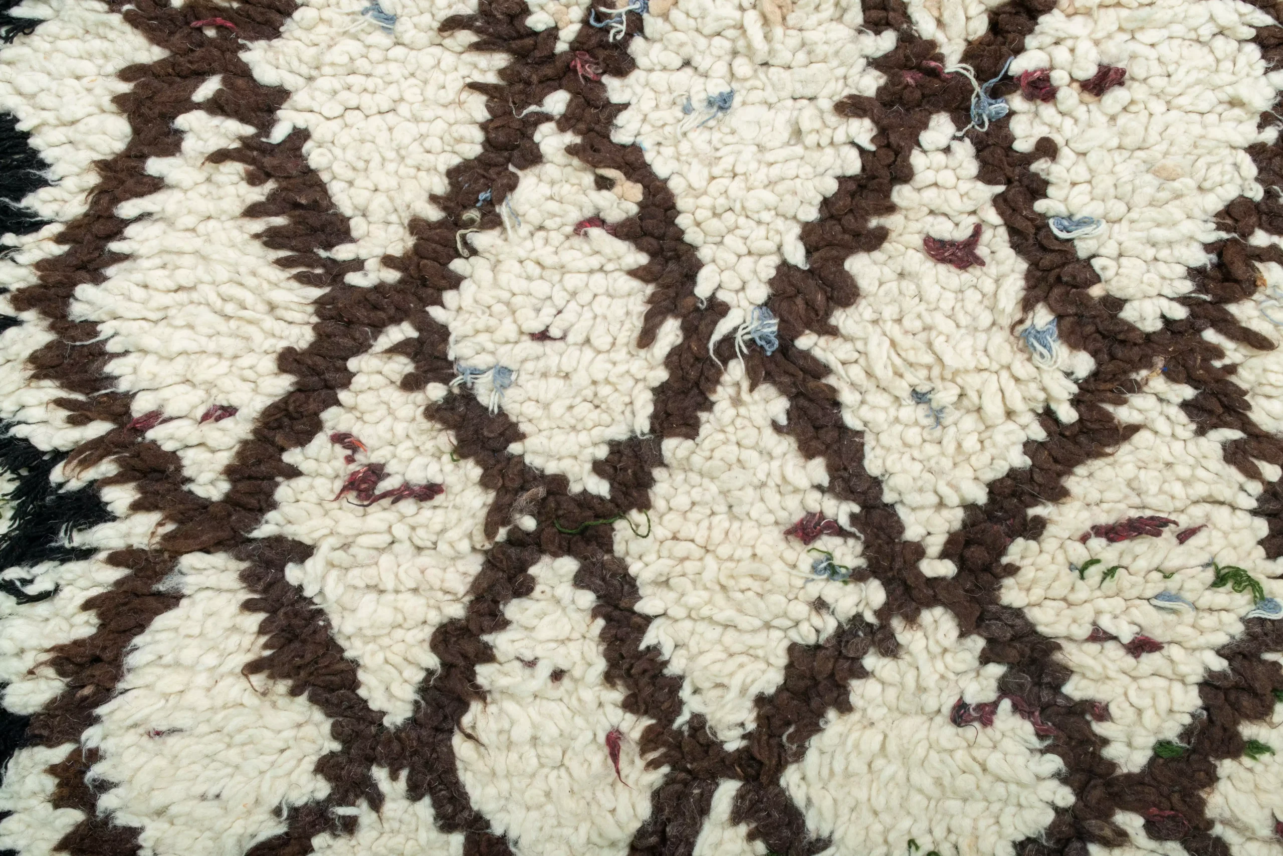 a rug with a pattern of brown and white. AZL-008_W-40_169-071 (7)