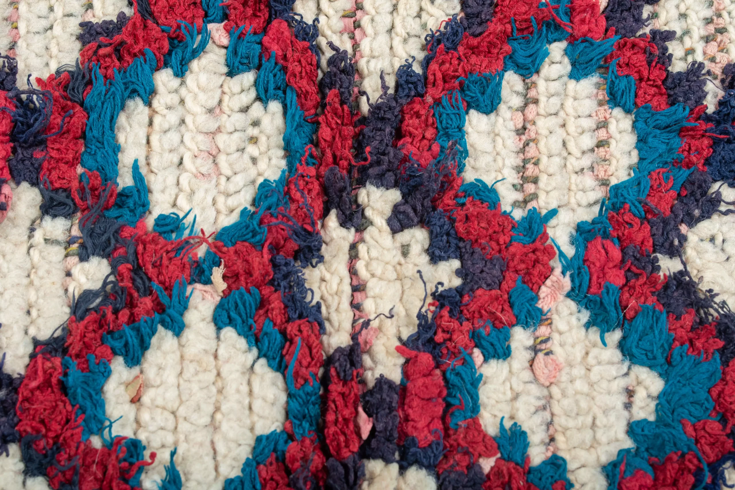 a close up of a moroccan rug with a red, white and blue pattern. AZL-014_W-40_176-080 (8)