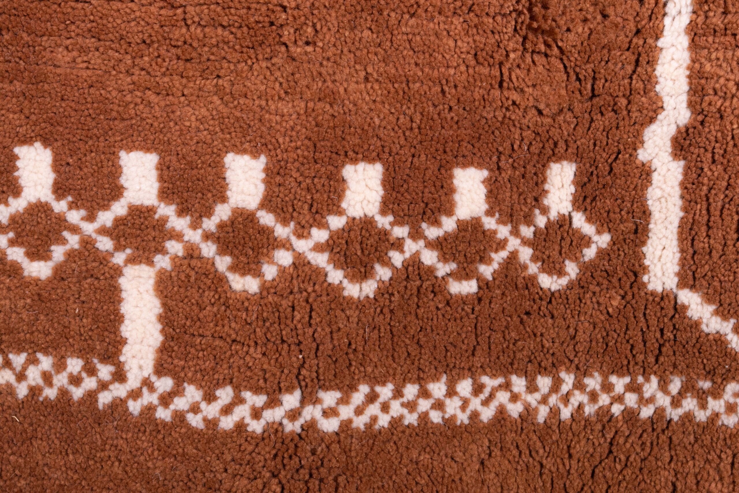 a brown rug with white designs on it. VIN0183_BR2-93_W-40 (8)