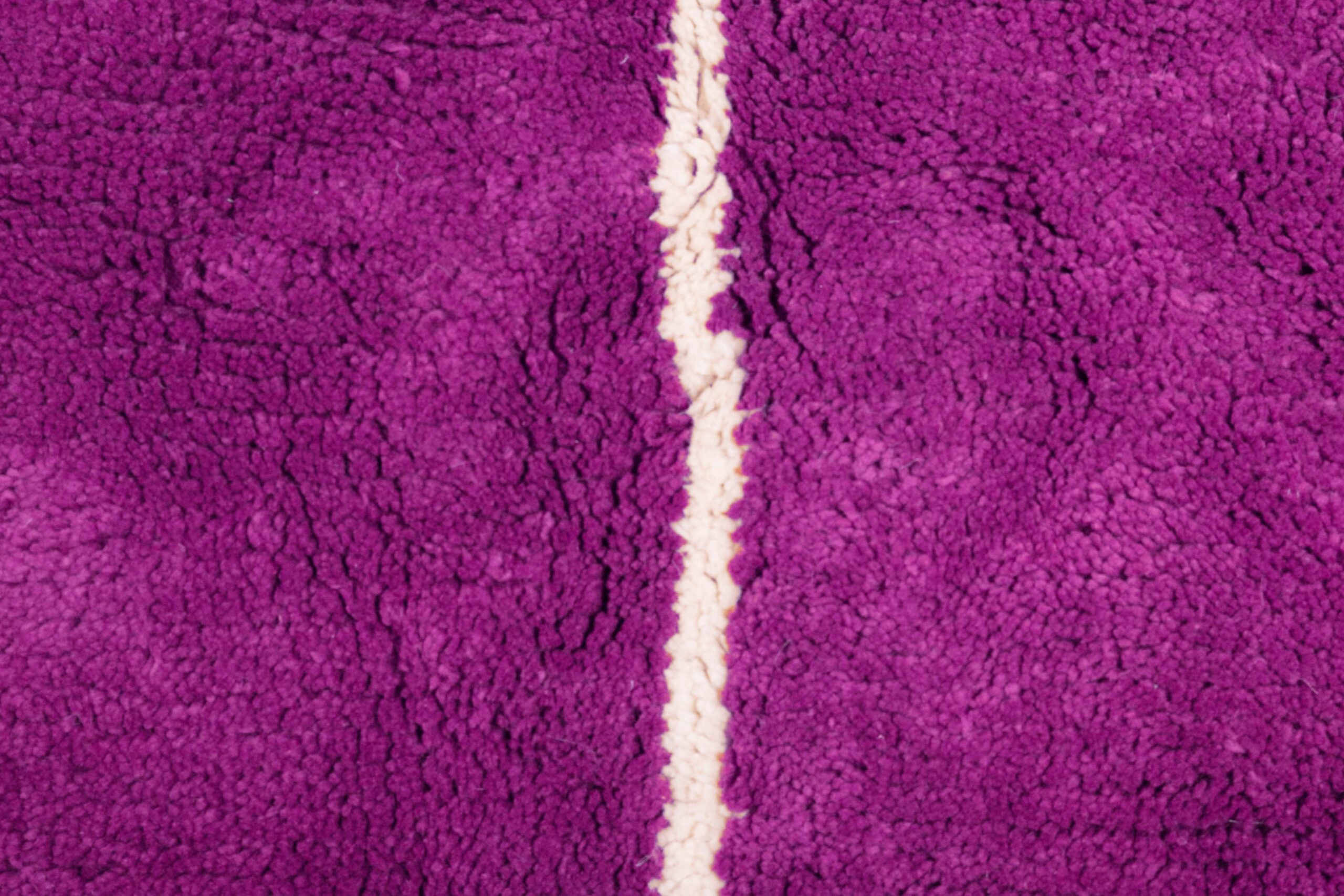 a purple rug with white trim. VIN0183_PN-33_W-40 (5)