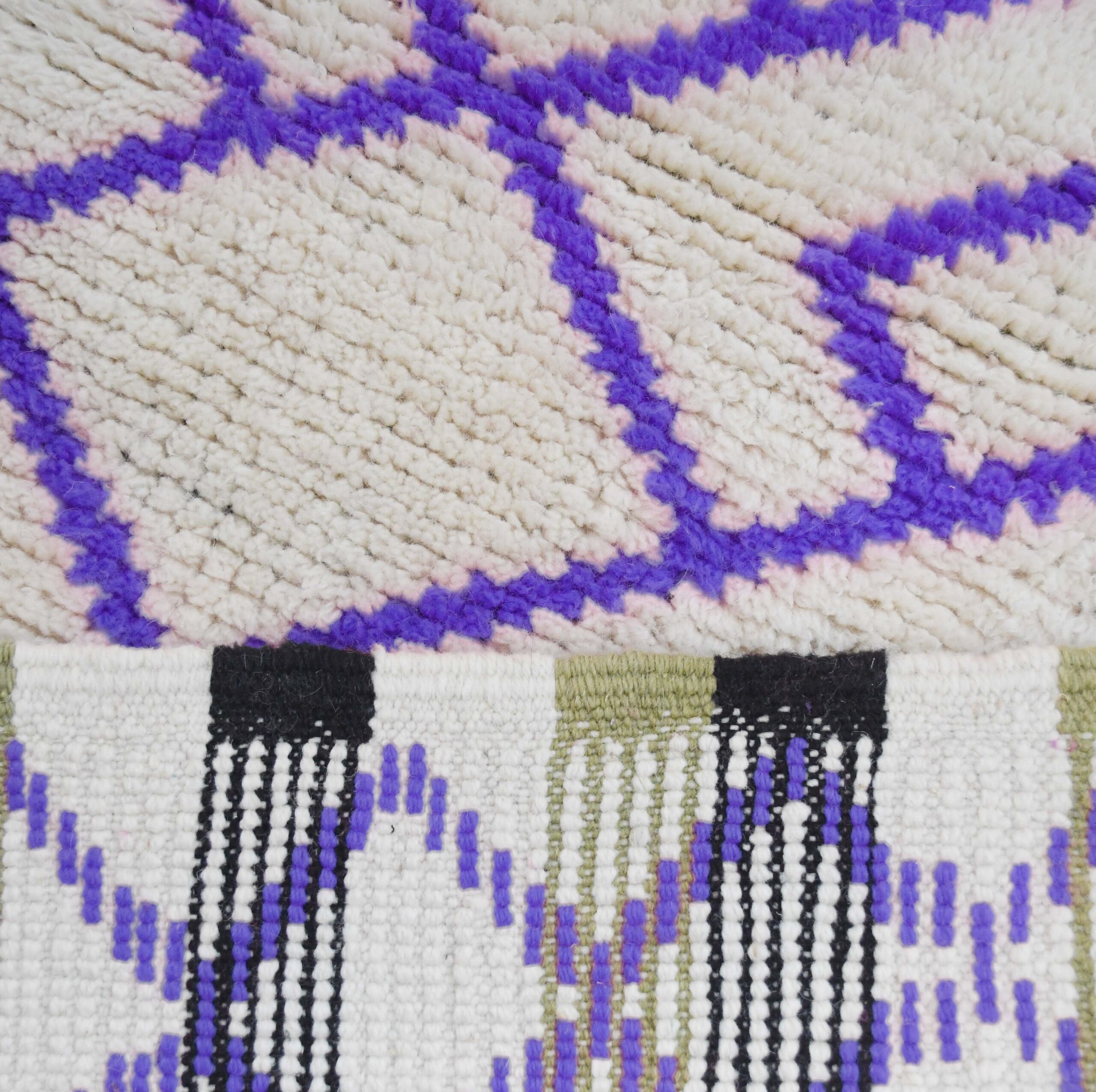 a close up of a rug with purple and white designs. VIN311_W-40_PR-19_BK-39_GR-13_05