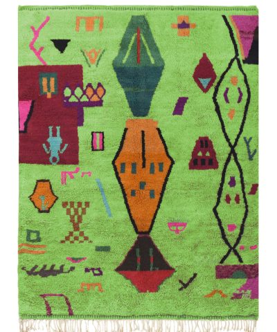 a green rug with colorful geometric designs. VIN312_GR-12_GR2-97_GR-11_OR-24_PN-35_PN-33_BL-09_BR-302_BR-32_BR-28_PR-19_GY_37_BK-39_01.1