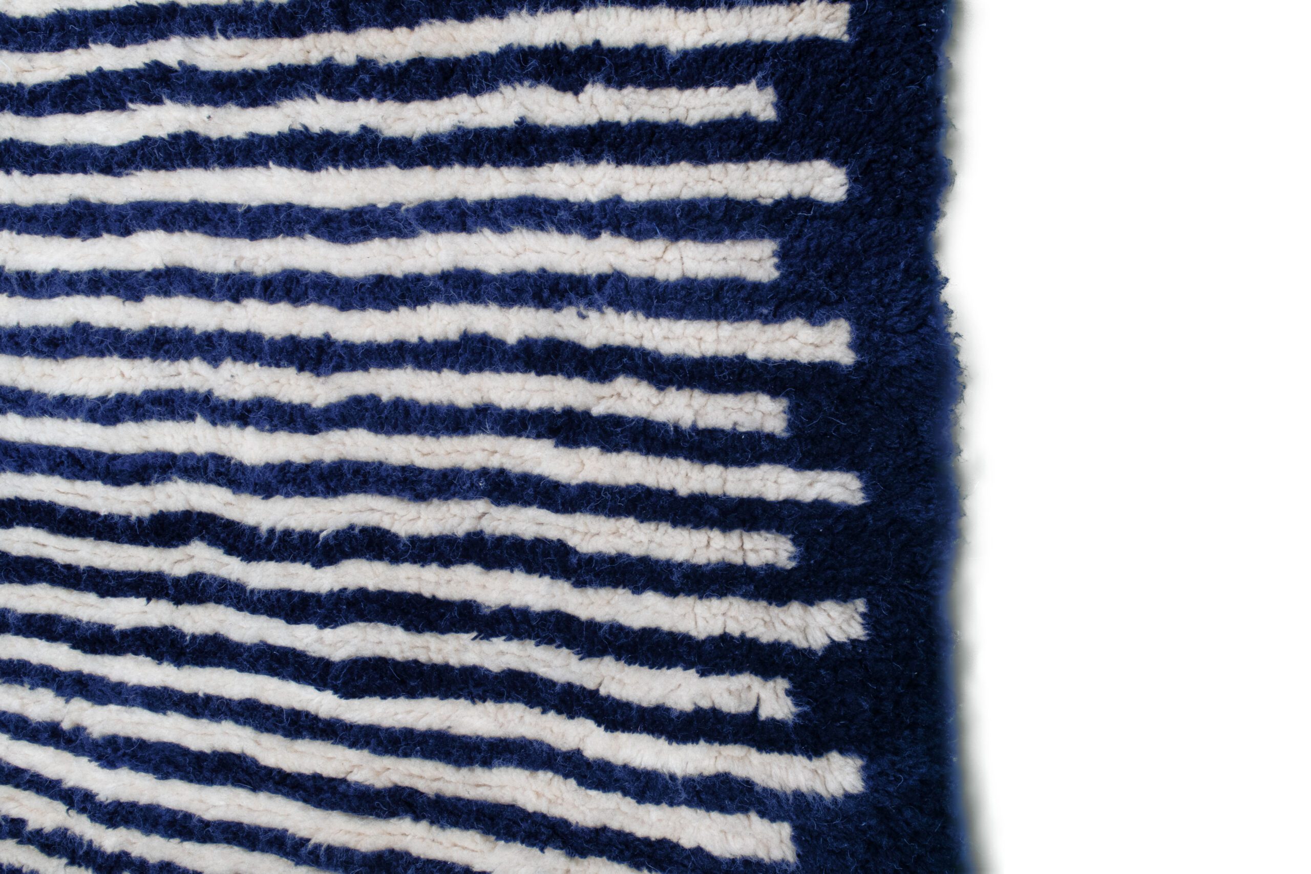 a blue and white rug with stripes. VINA034-W-40_BL-01 (4)