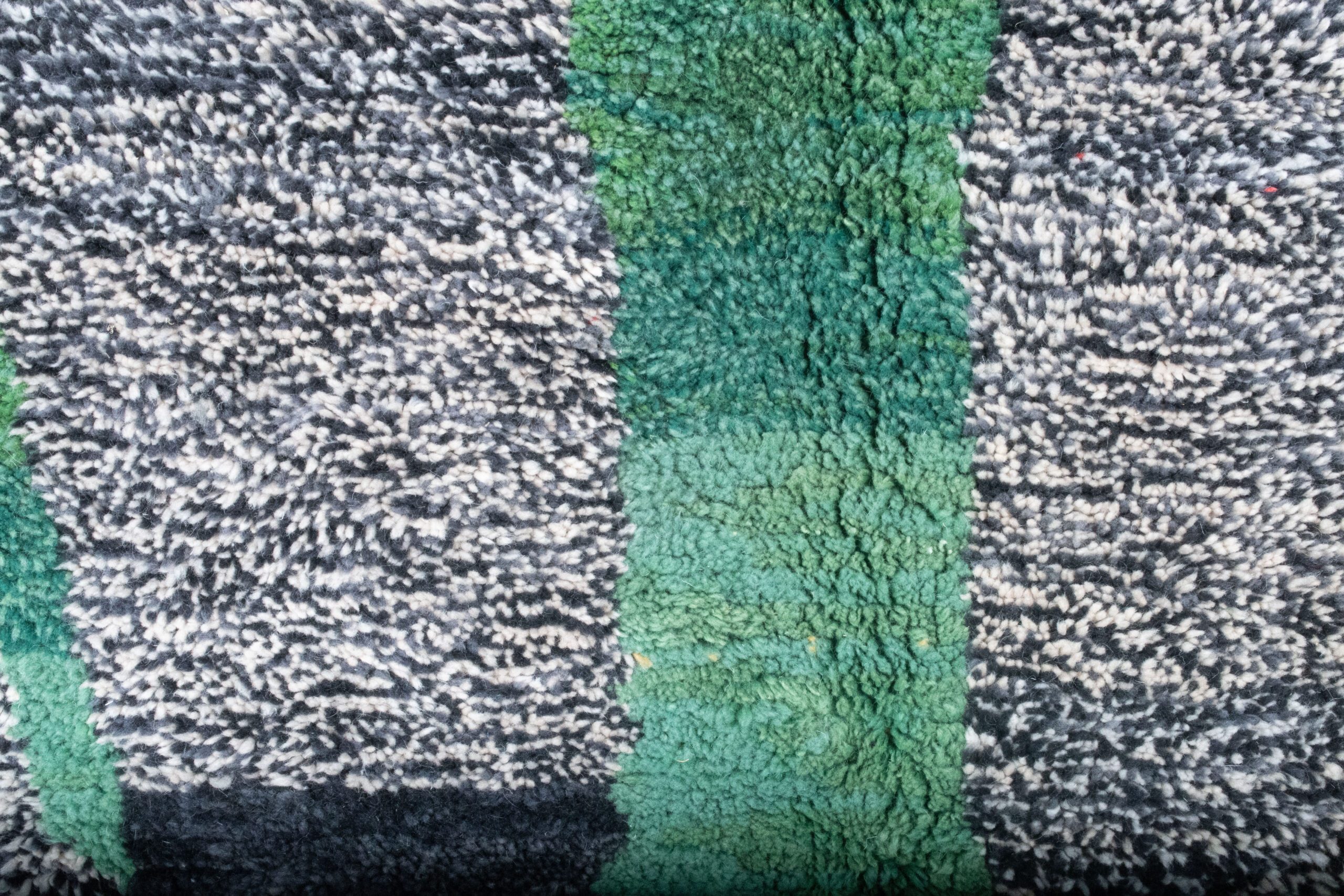 a green and black rug with a white stripe. VINX11_BK-39_W-40_YL-16_GR-10_GR-11_OR-24 (5)