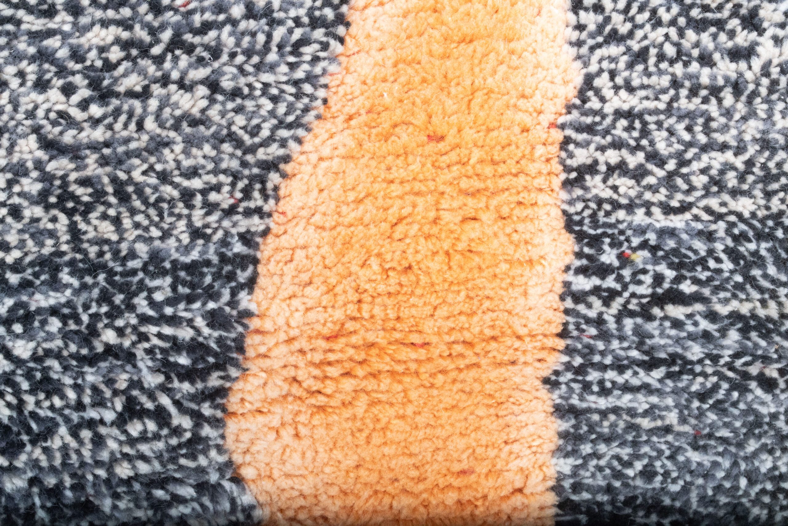 a close up of a rug with a black and orange stripe. VINX11_BK-39_W-40_YL-16_GR-10_GR-11_OR-24 (6)