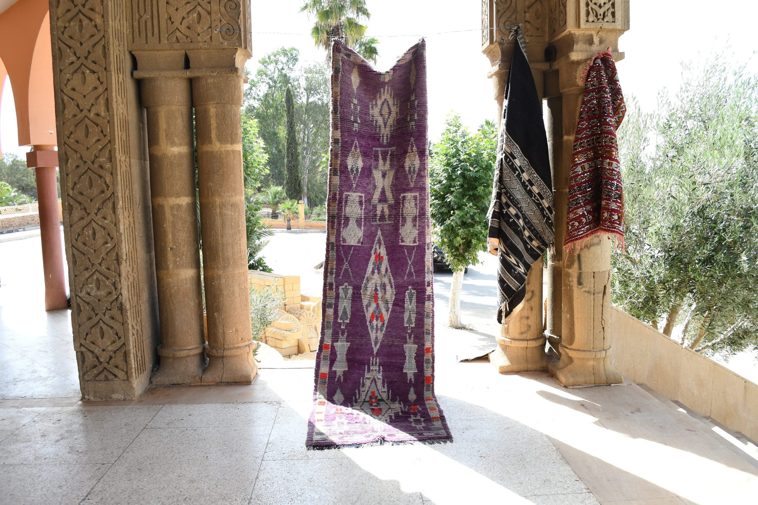 a purple and black moroccan rug. il_fullxfull.6017181218_stkz.jpg