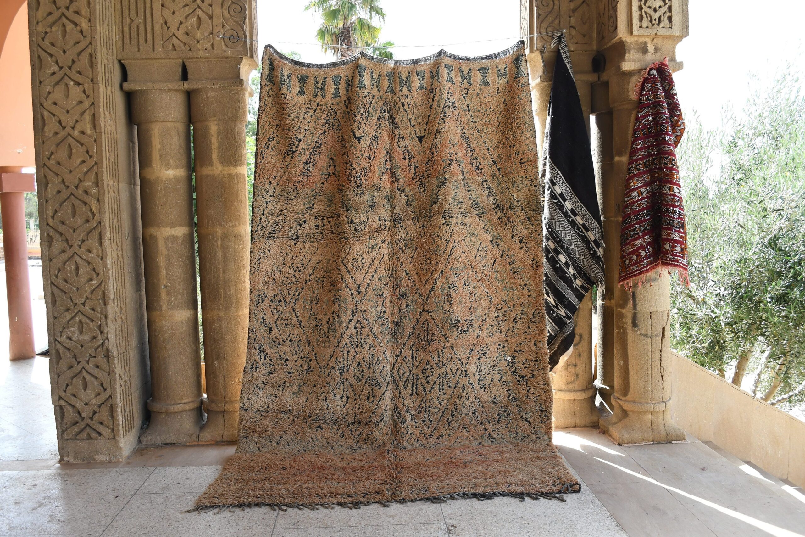 a rug hanging on a wall in a room. il_fullxfull.6017184052_ci3t.jpg