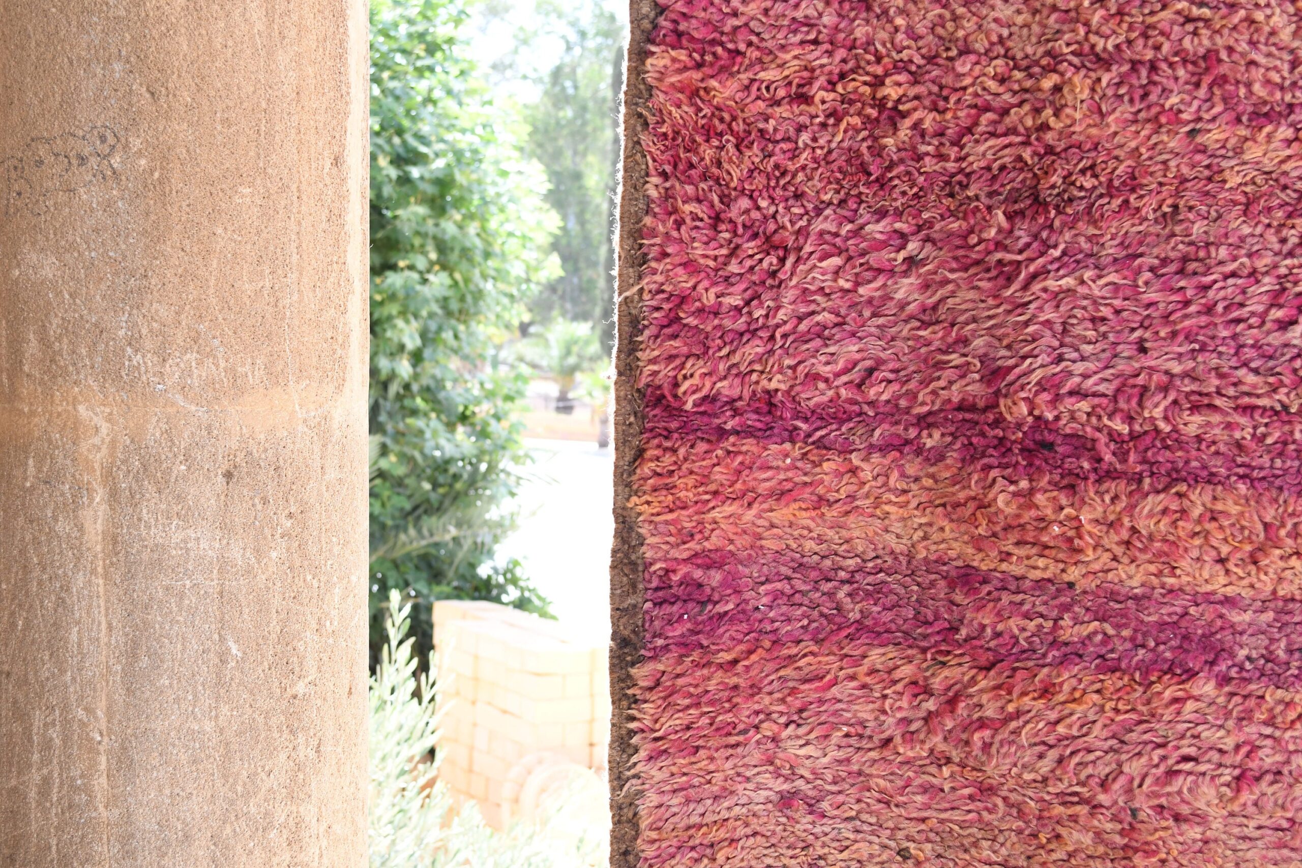 a cat is sitting on a rug in a room. il_fullxfull.6017187696_sc1q.jpg