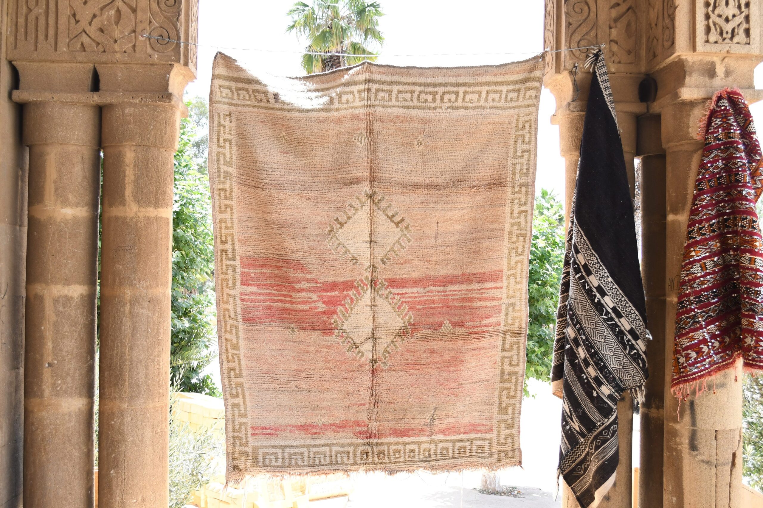 a red and black rug hanging on a wall. il_fullxfull.6017202678_owe1.jpg