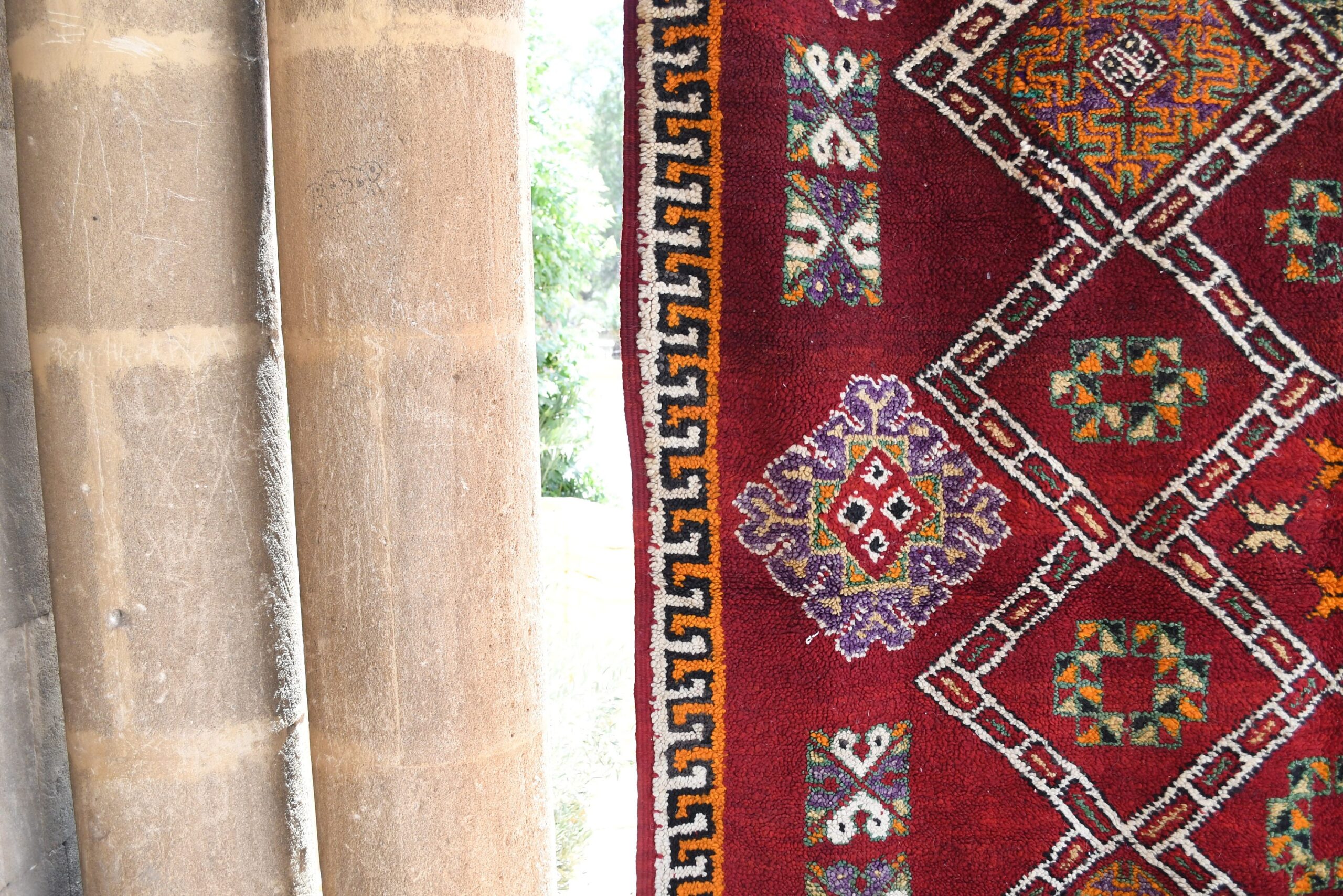 a red rug with a pattern on it. il_fullxfull.6017206164_gm2y.jpg