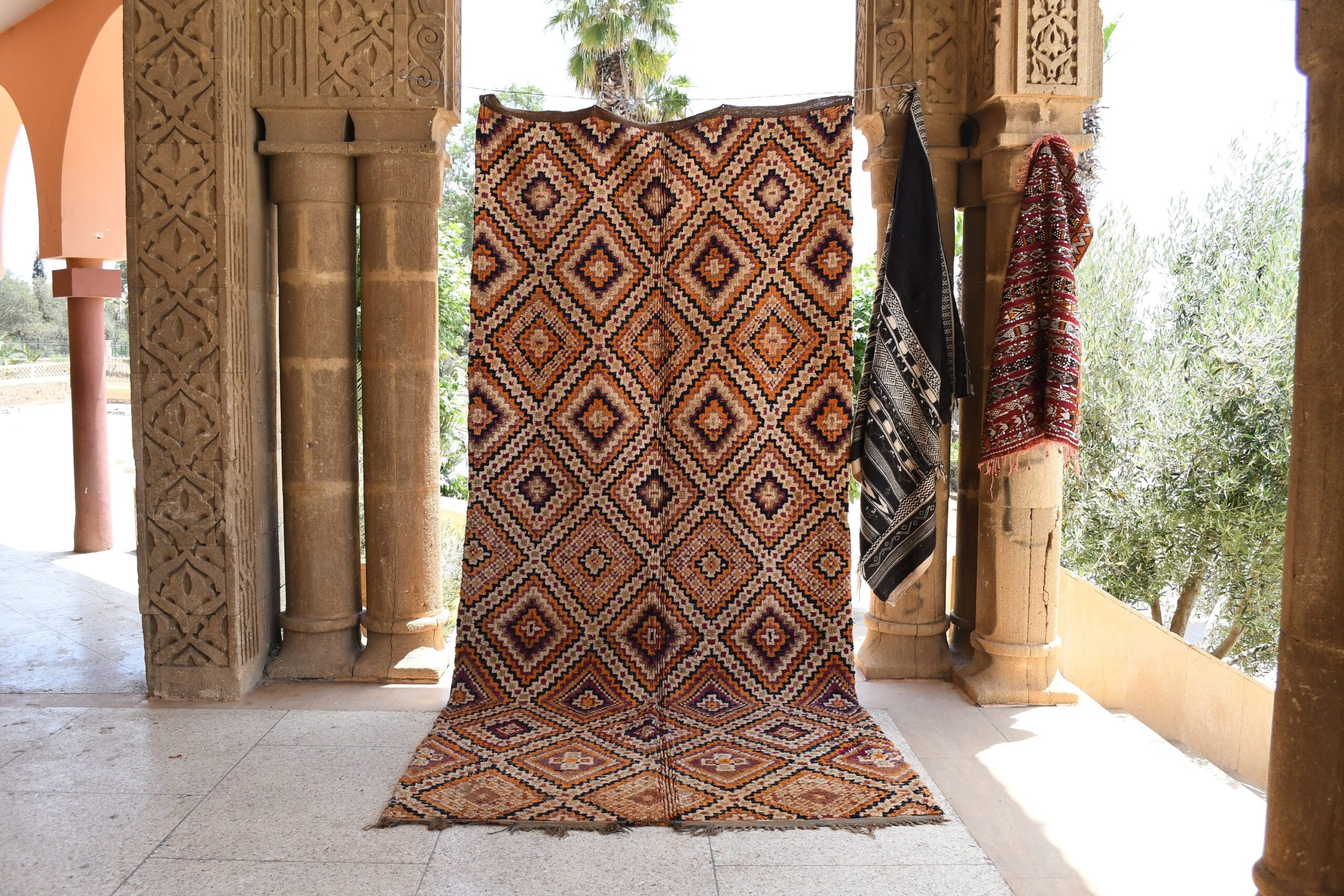 a rug is on display in a room. il_fullxfull.6017212368_pxhy.jpg