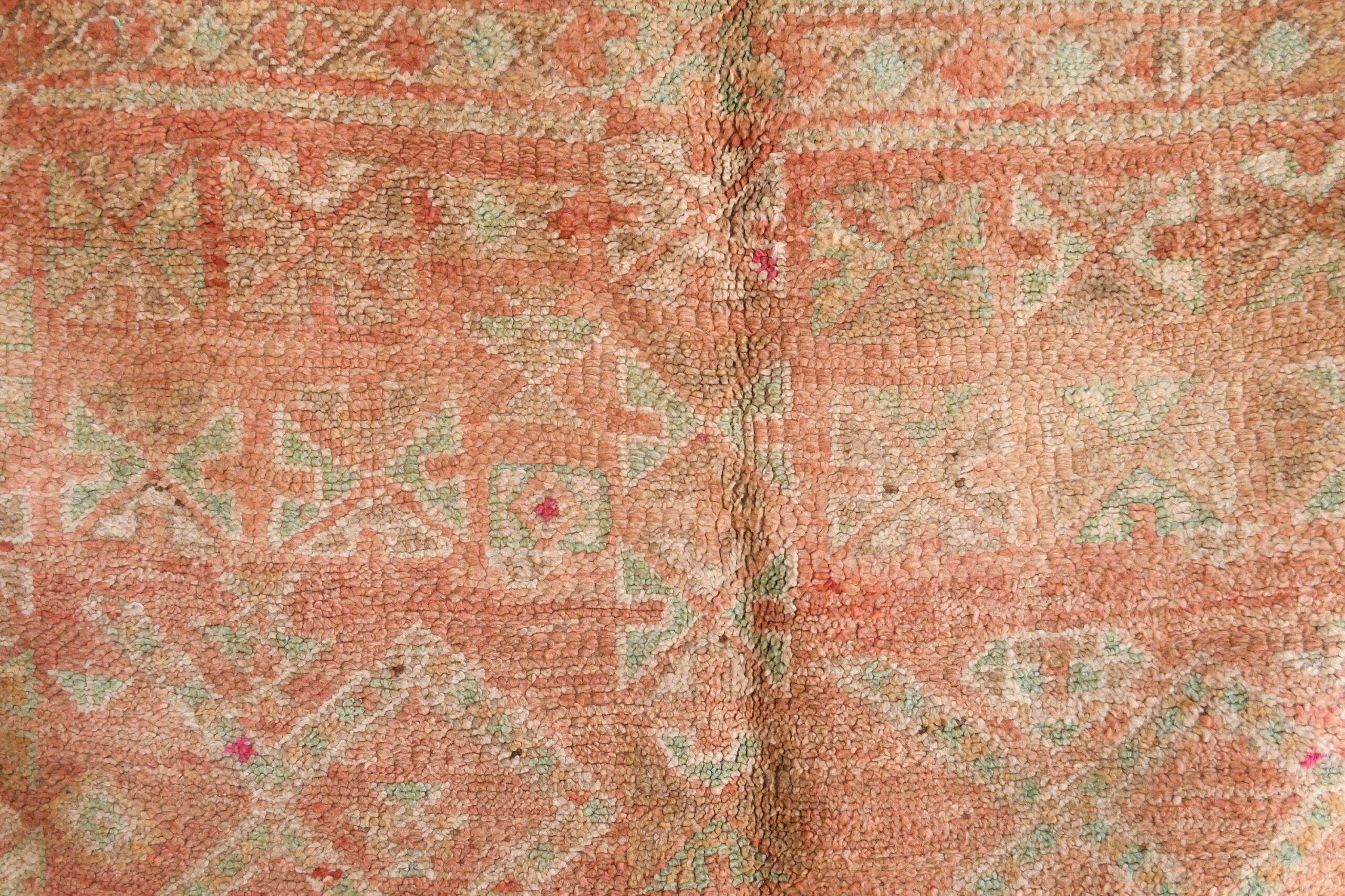 a large antique rug with a floral design. il_fullxfull.6017455408_sj6a.jpg