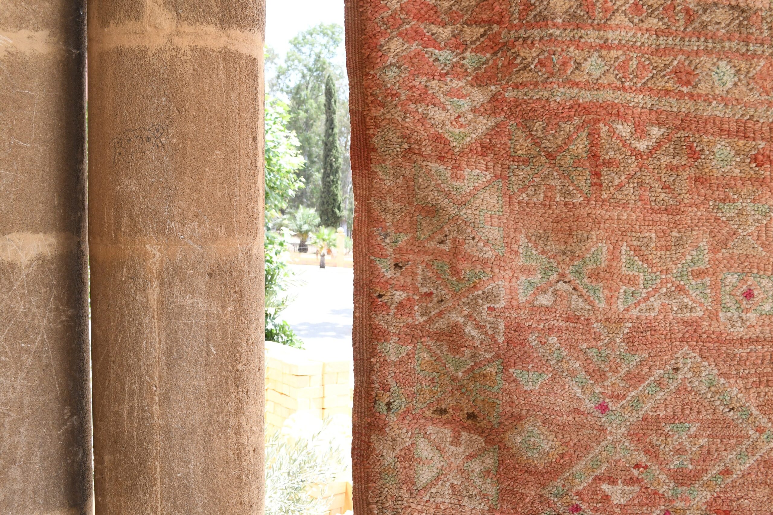 a cat sitting on a wall next to a window. il_fullxfull.6017455610_2tqo.jpg