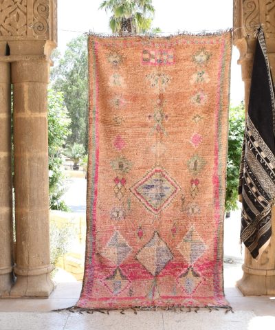 a rug hanging on a wall in a room. il_fullxfull.6017459642_3ke6.jpg