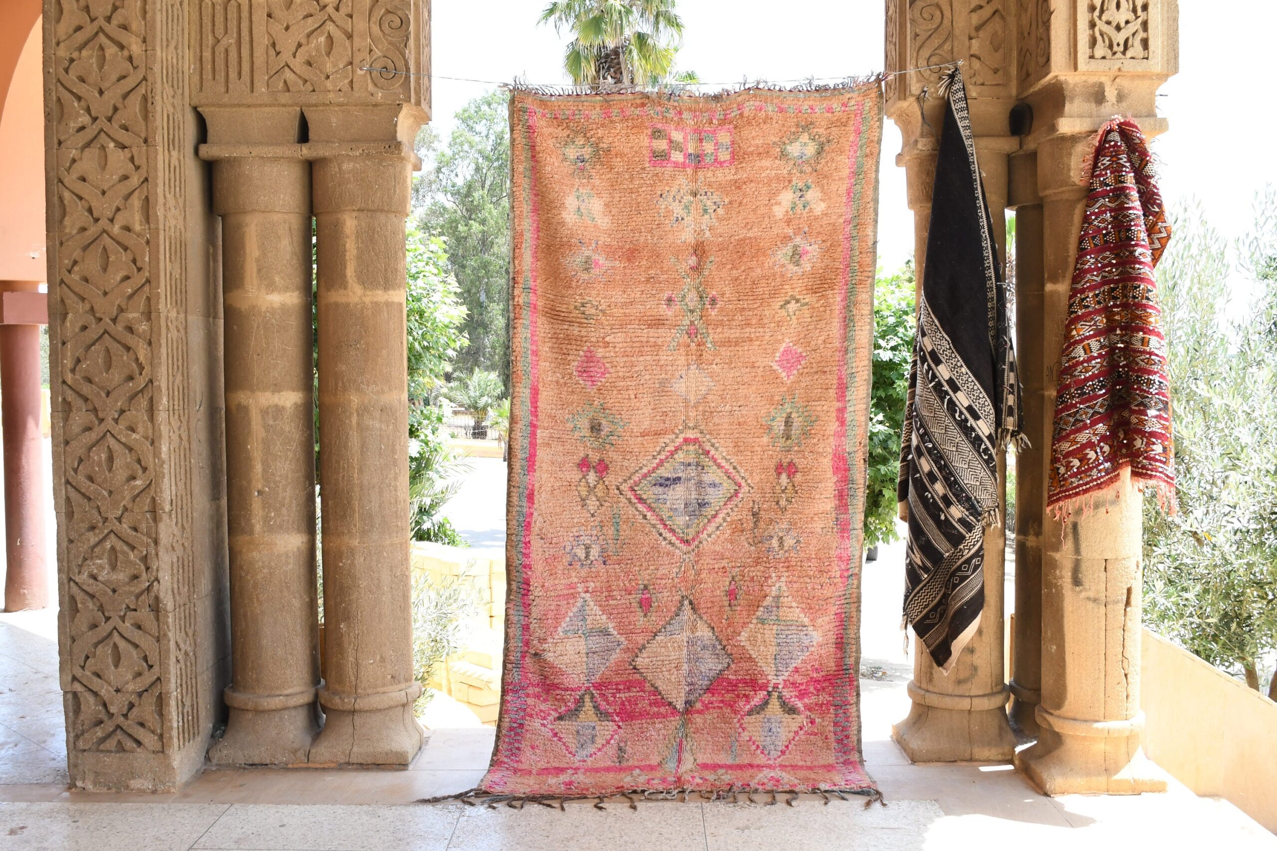 a rug hanging on a wall in a room. il_fullxfull.6017459642_3ke6.jpg