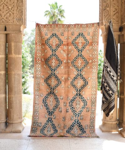 a rug hanging on a wall in a room. il_fullxfull.6017460748_jlla.jpg