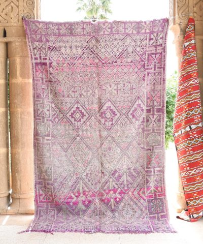 a woman sitting on a porch with a rug. il_fullxfull.6017464400_r6vf.jpg