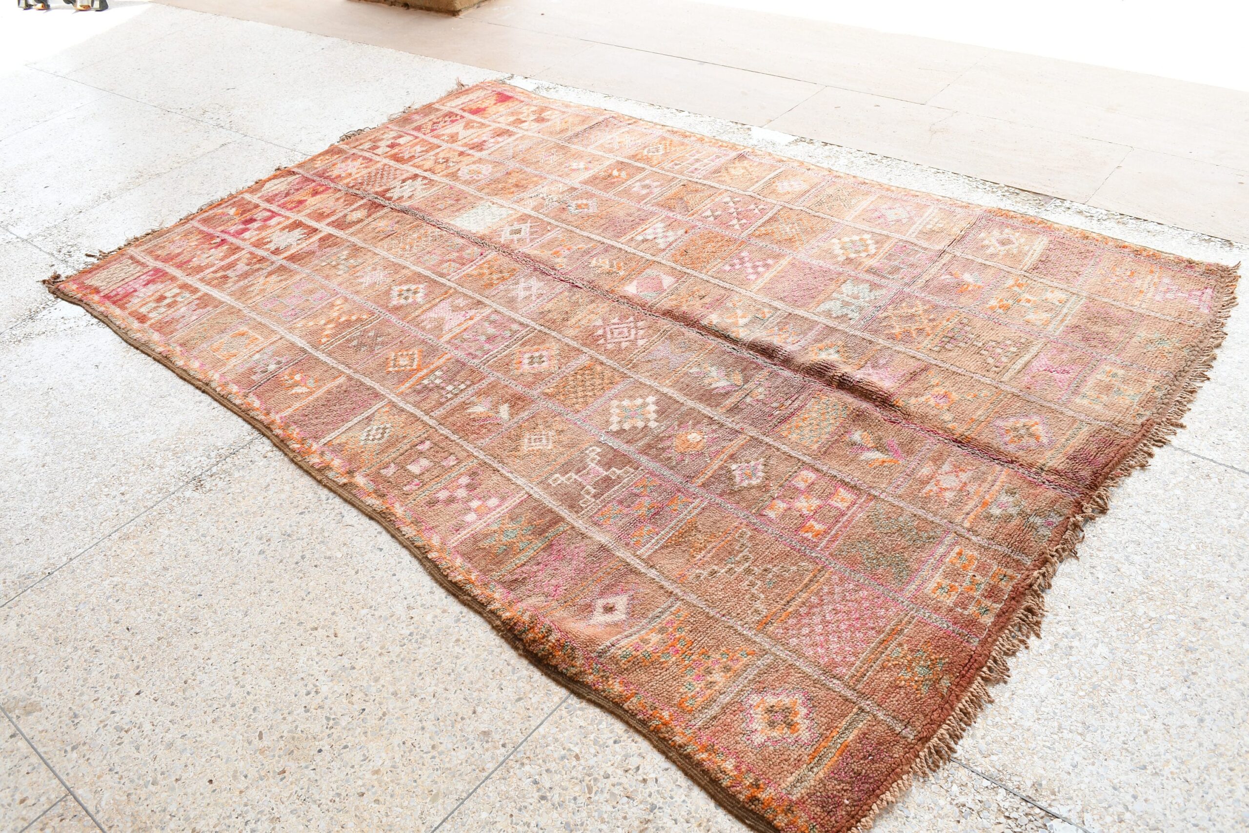 a pink and brown rug with a pattern on the floor. il_fullxfull.6017466864_o0wg.jpg