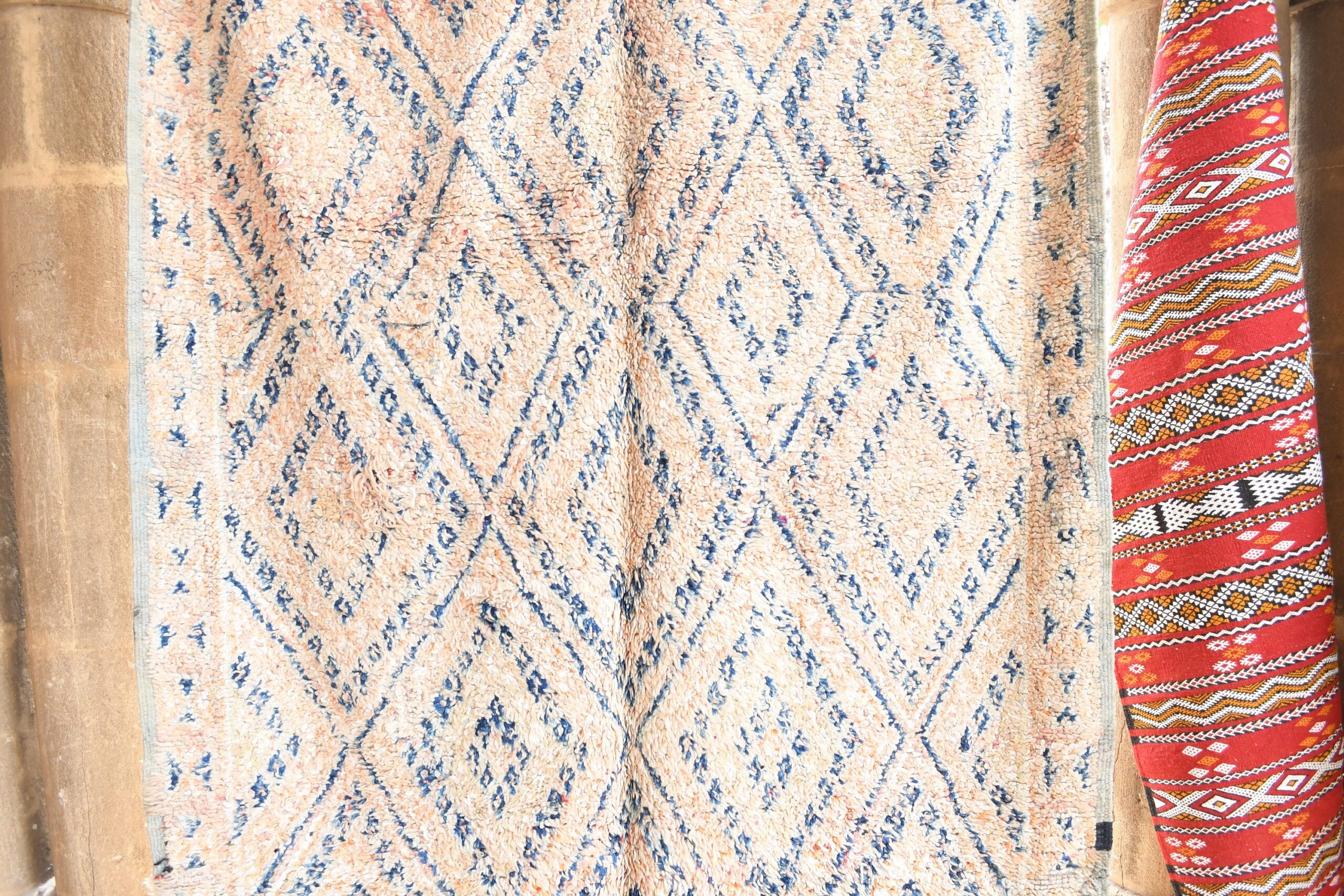 a red and blue patterned tie hanging on a wall. il_fullxfull.6017470022_e3gz.jpg