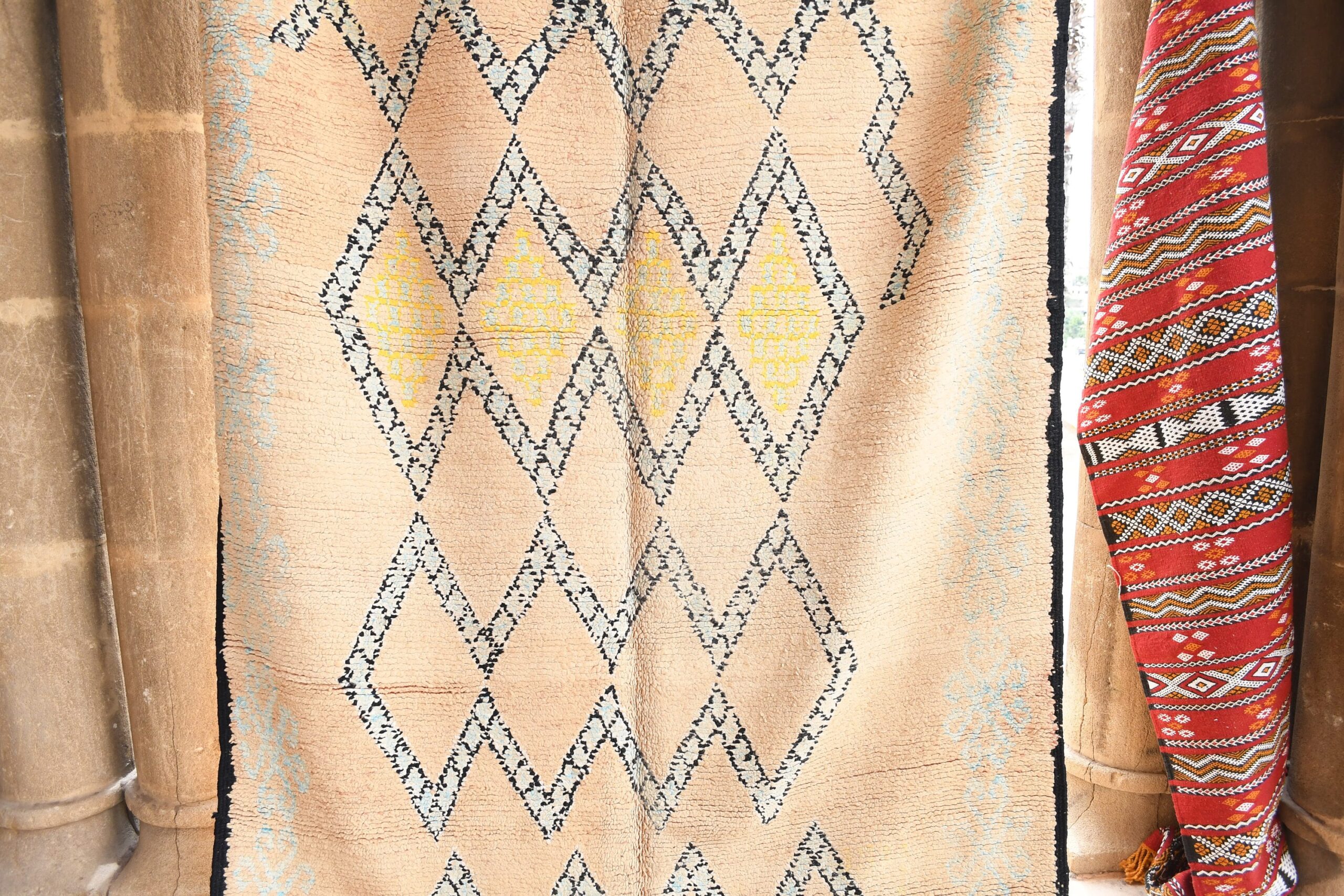 a close up of a moroccan rug on a table. il_fullxfull.6017474214_5j6i.jpg