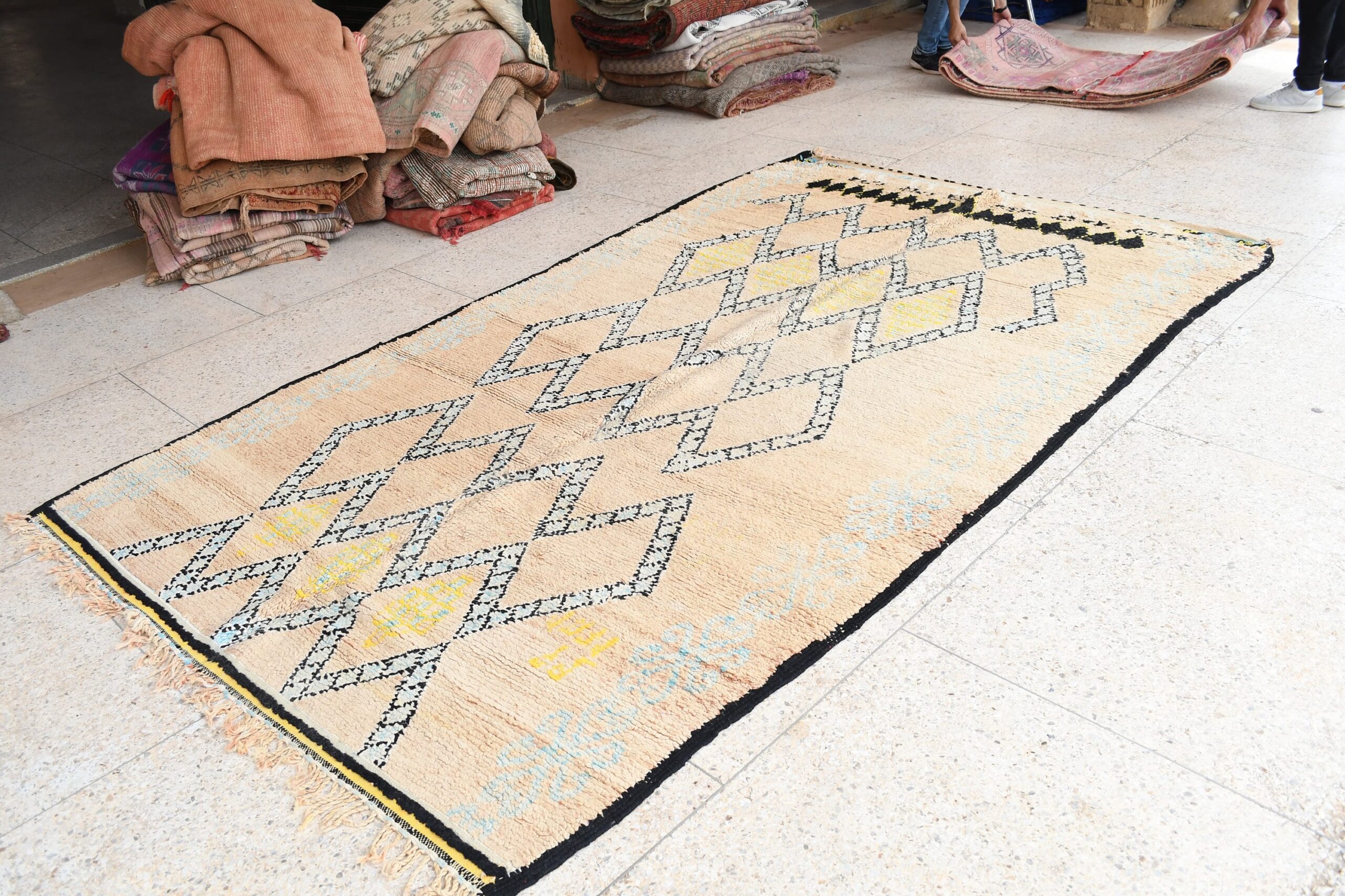 a rug is on the floor in a room. il_fullxfull.6017474926_hf41.jpg