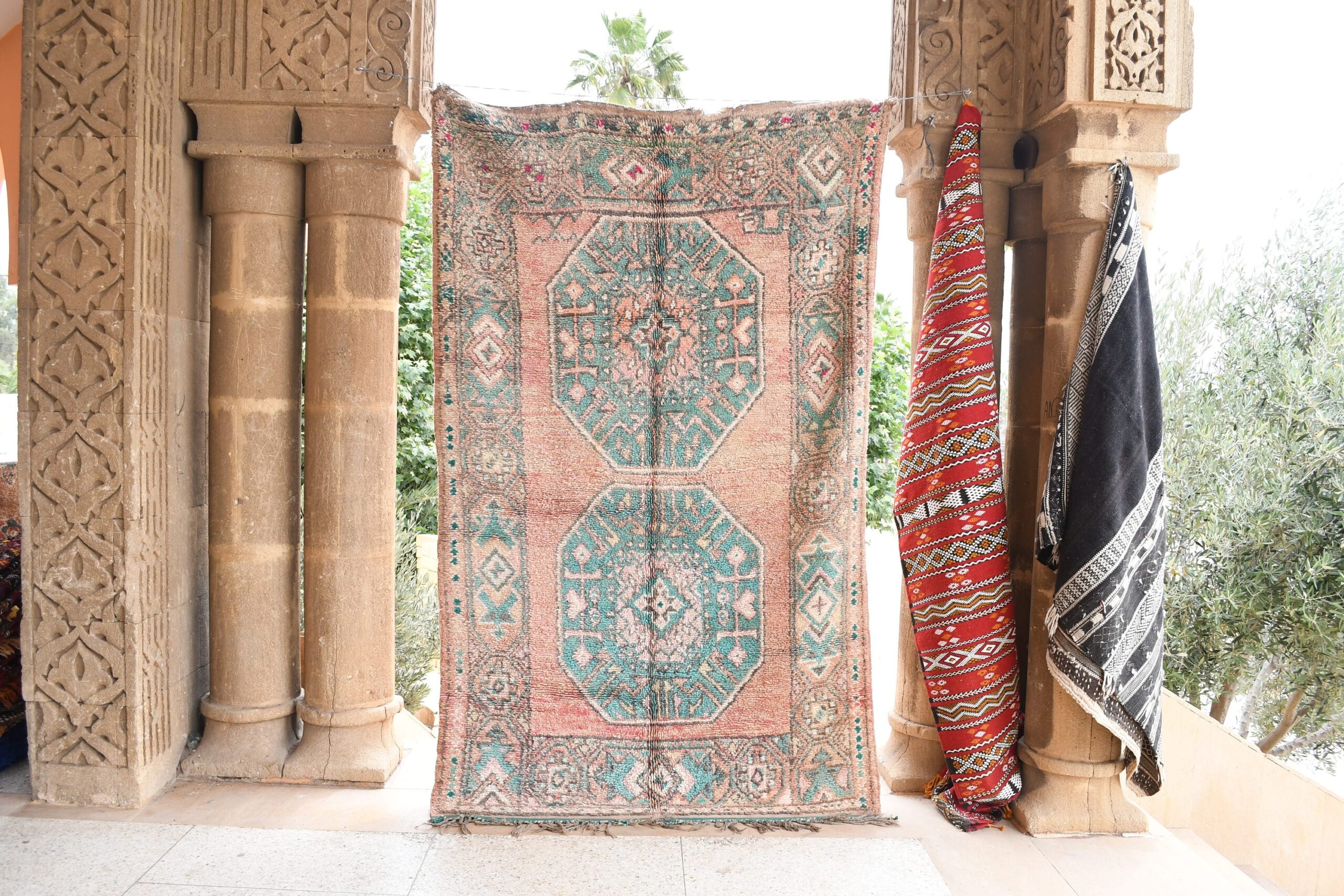 a rug hanging on a wall in a house. il_fullxfull.6017478590_tddt.jpg