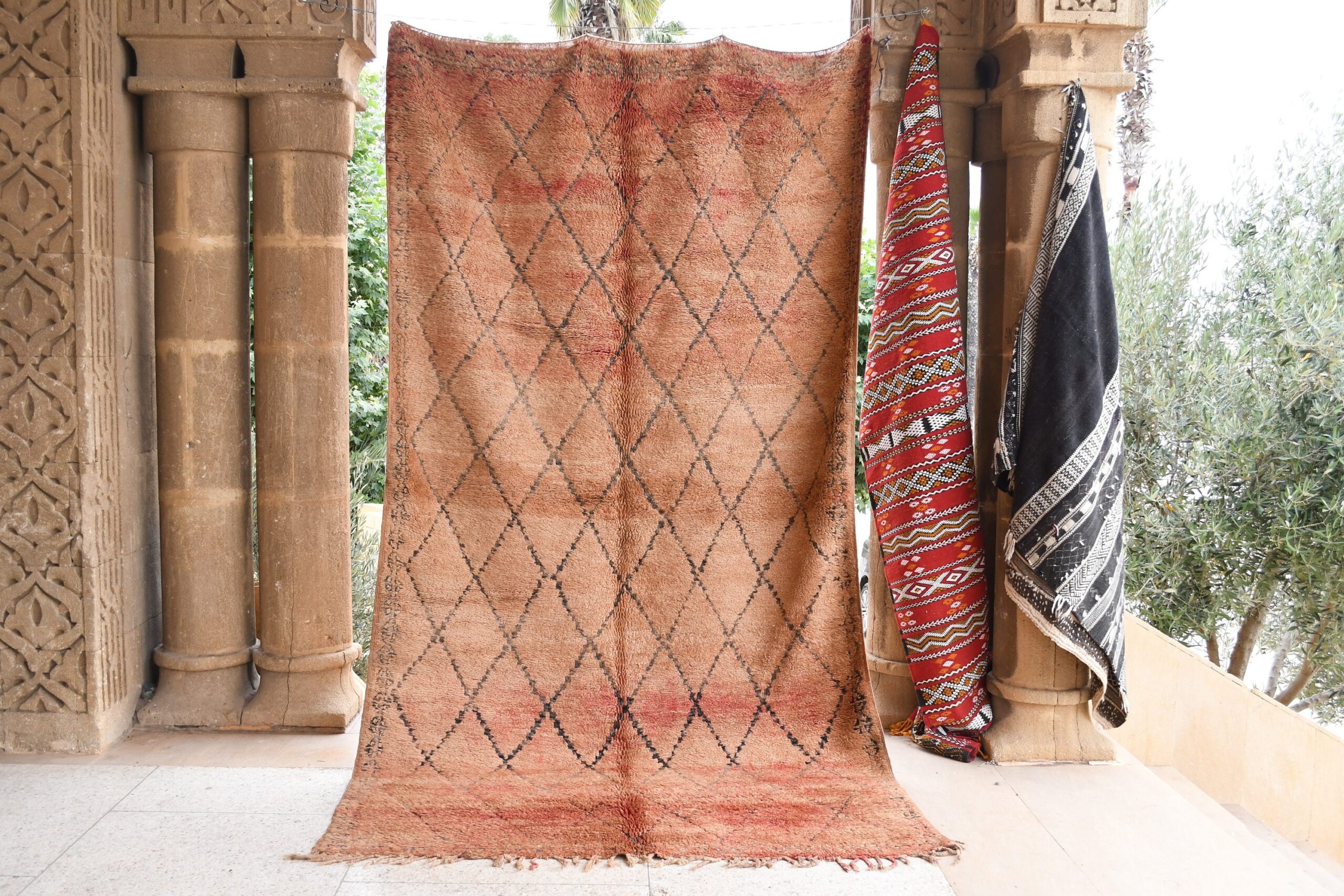 a rug hanging on a wall. il_fullxfull.6017485980_2mb3.jpg