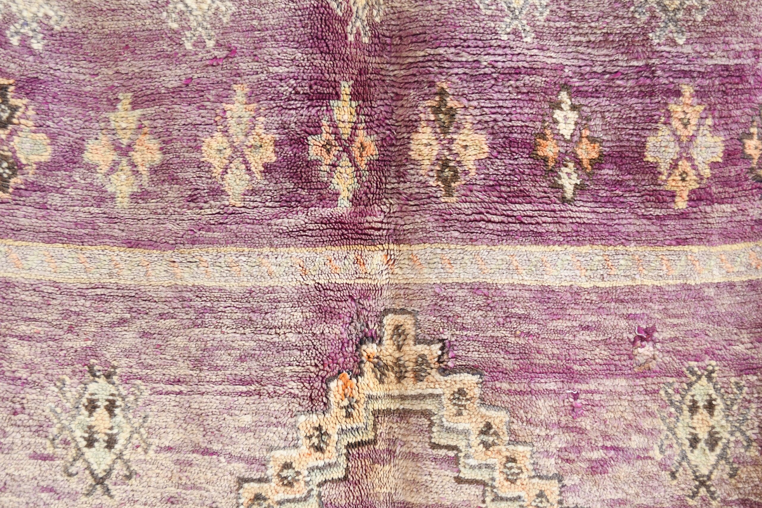 a purple and beige rug with a pattern. il_fullxfull.6017499980_f6cu.jpg