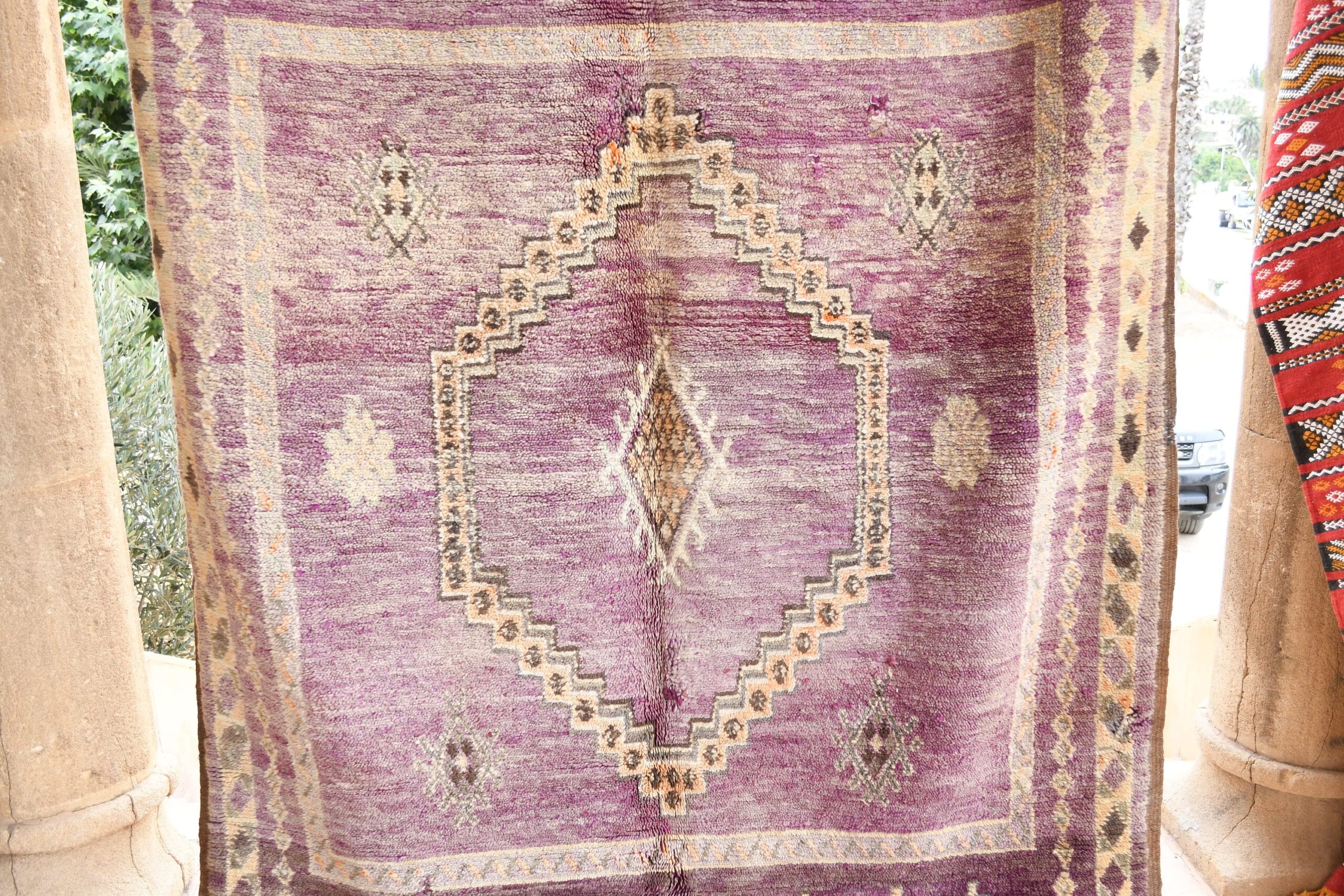 a purple rug with a pattern on it. il_fullxfull.6017500318_7985.jpg