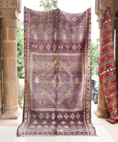 a purple rug hanging on a wall. il_fullxfull.6017500552_tt9y.jpg