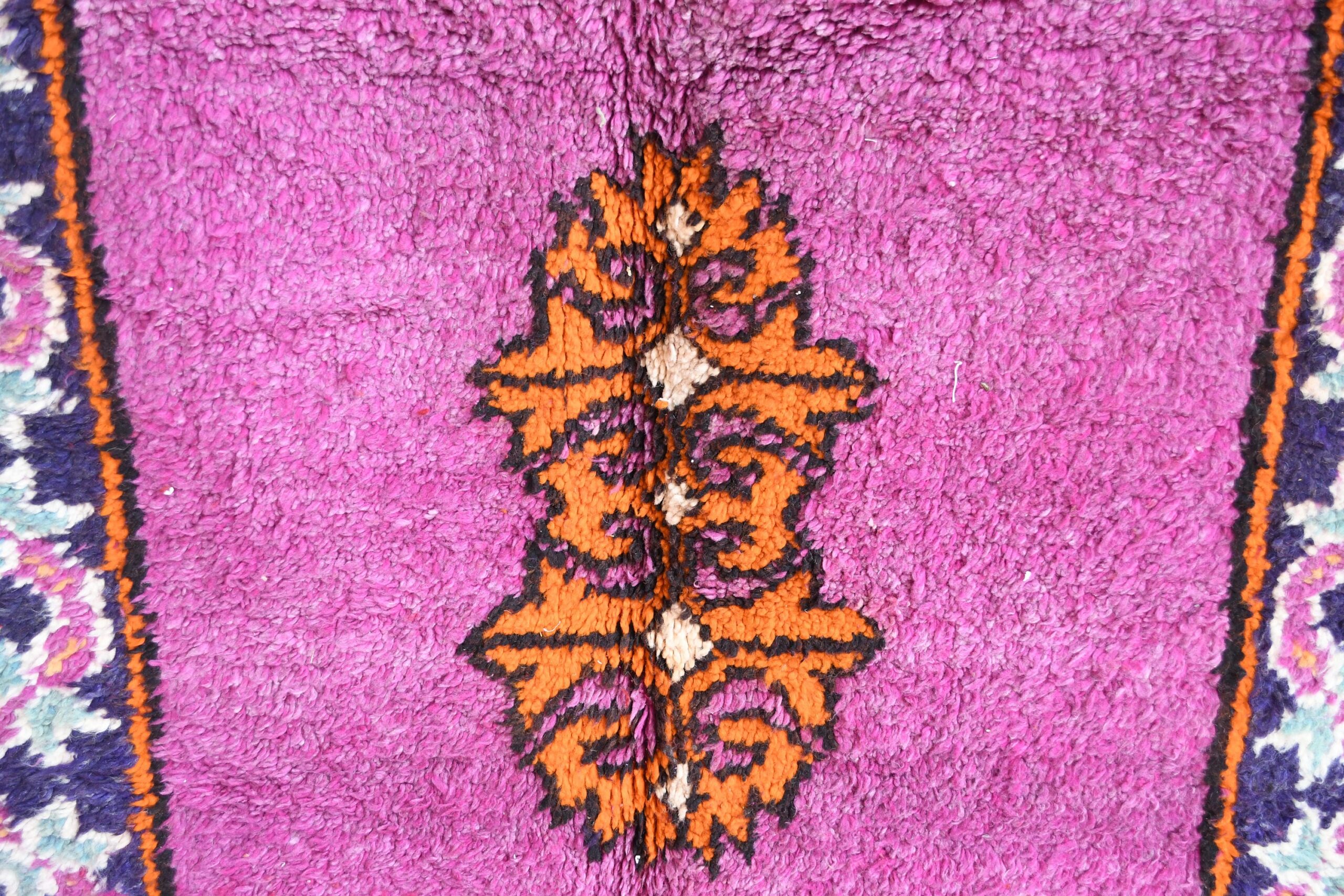 a rug with a purple and orange design. il_fullxfull.6017502214_kny3.jpg