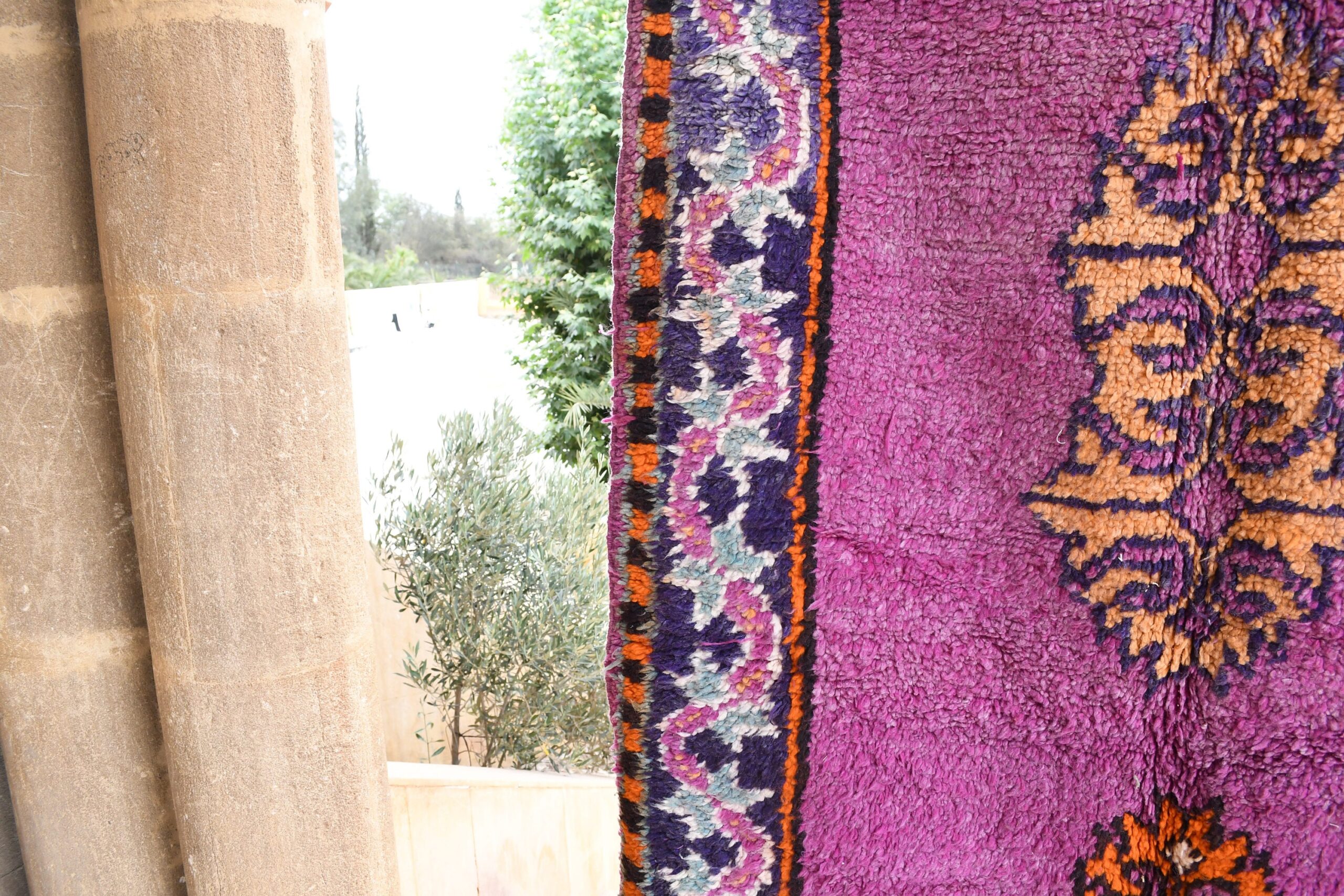 a purple rug with a pattern. il_fullxfull.6017502336_gncc.jpg