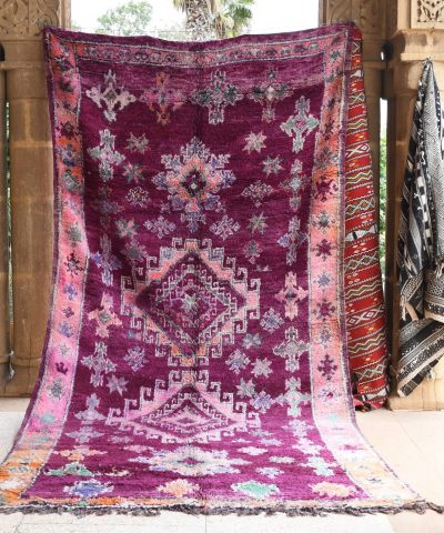 a purple rug with a floral design on it. il_fullxfull.6017504988_8w0b.jpg