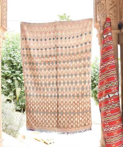 a group of colorfully colored carpets hanging on a wall. il_fullxfull.6017507018_71n3.jpg