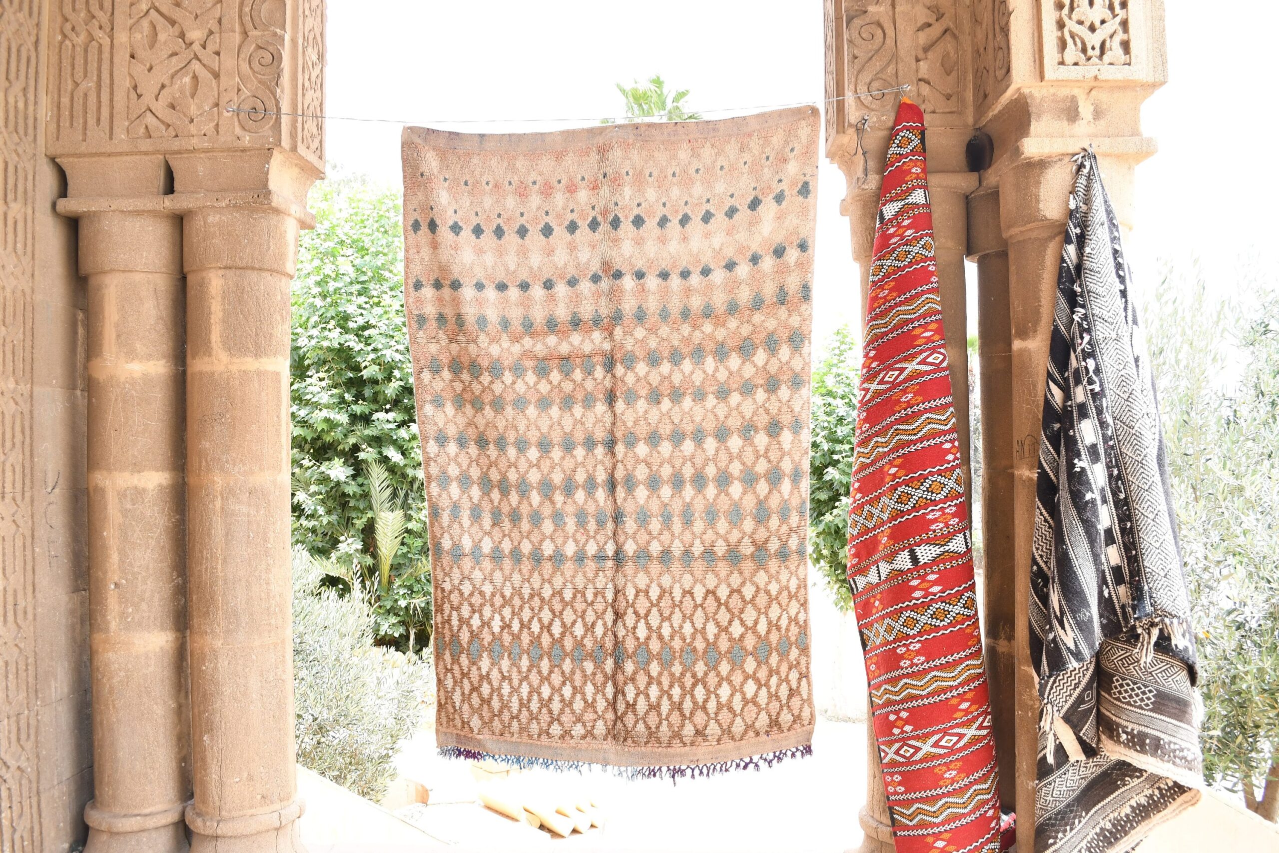 a group of colorfully colored carpets hanging on a wall. il_fullxfull.6017507018_71n3.jpg