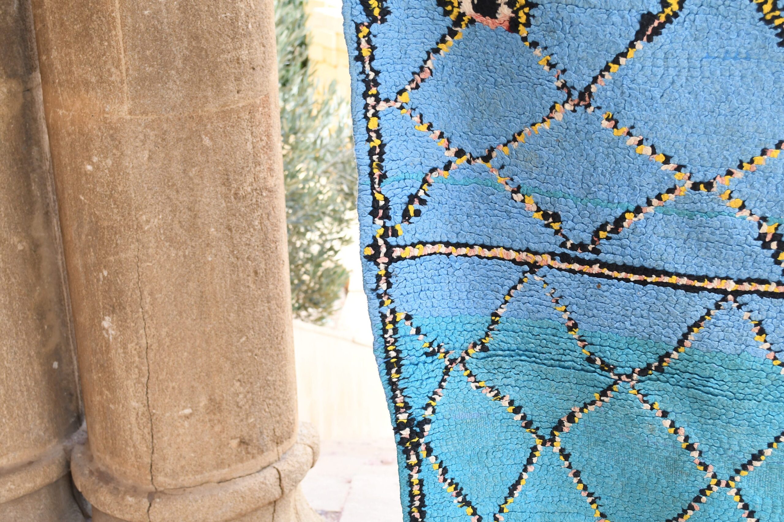 a blue and yellow moroccan rug. il_fullxfull.6017510374_noyy.jpg