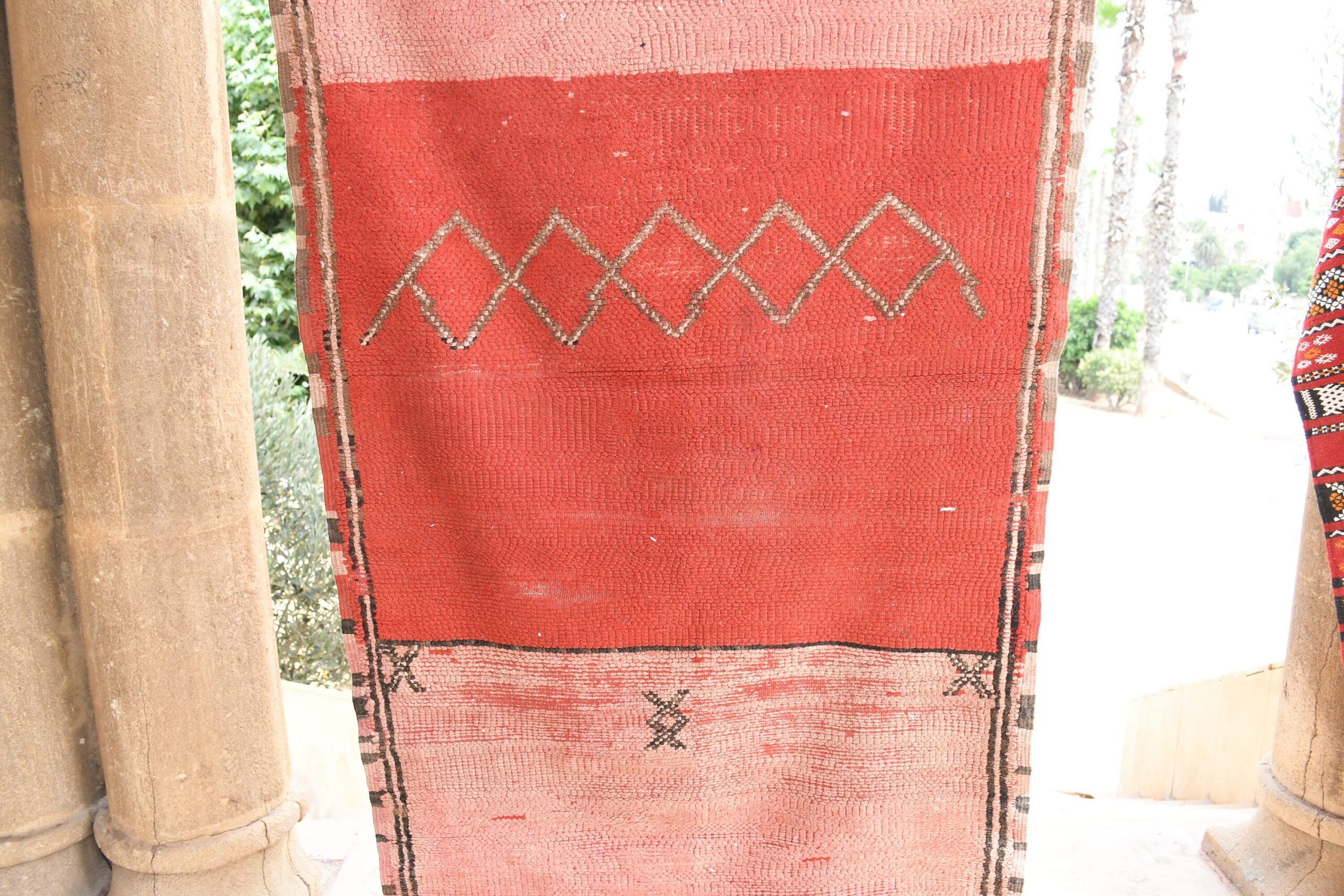 a red rug. il_fullxfull.6017514138_bb30.jpg