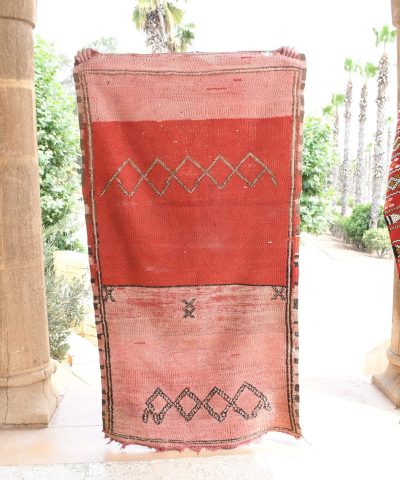 a red rug and a red rug in a doorway. il_fullxfull.6017514334_9sfr.jpg