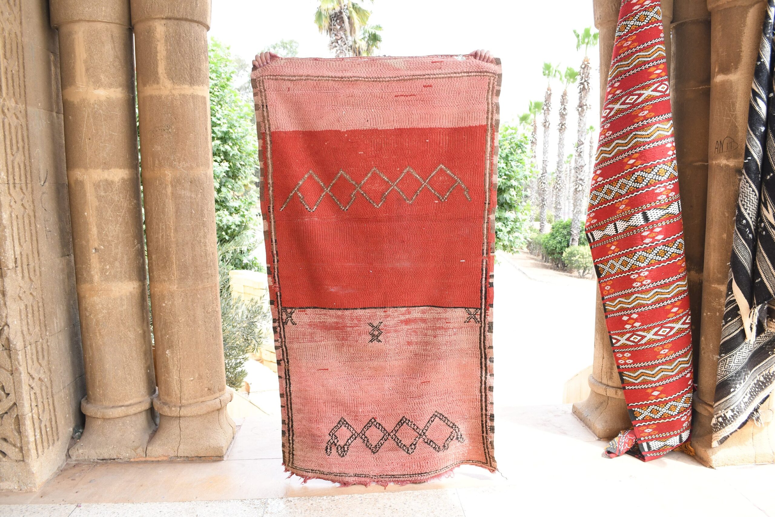 a red rug and a red rug in a doorway. il_fullxfull.6017514334_9sfr.jpg