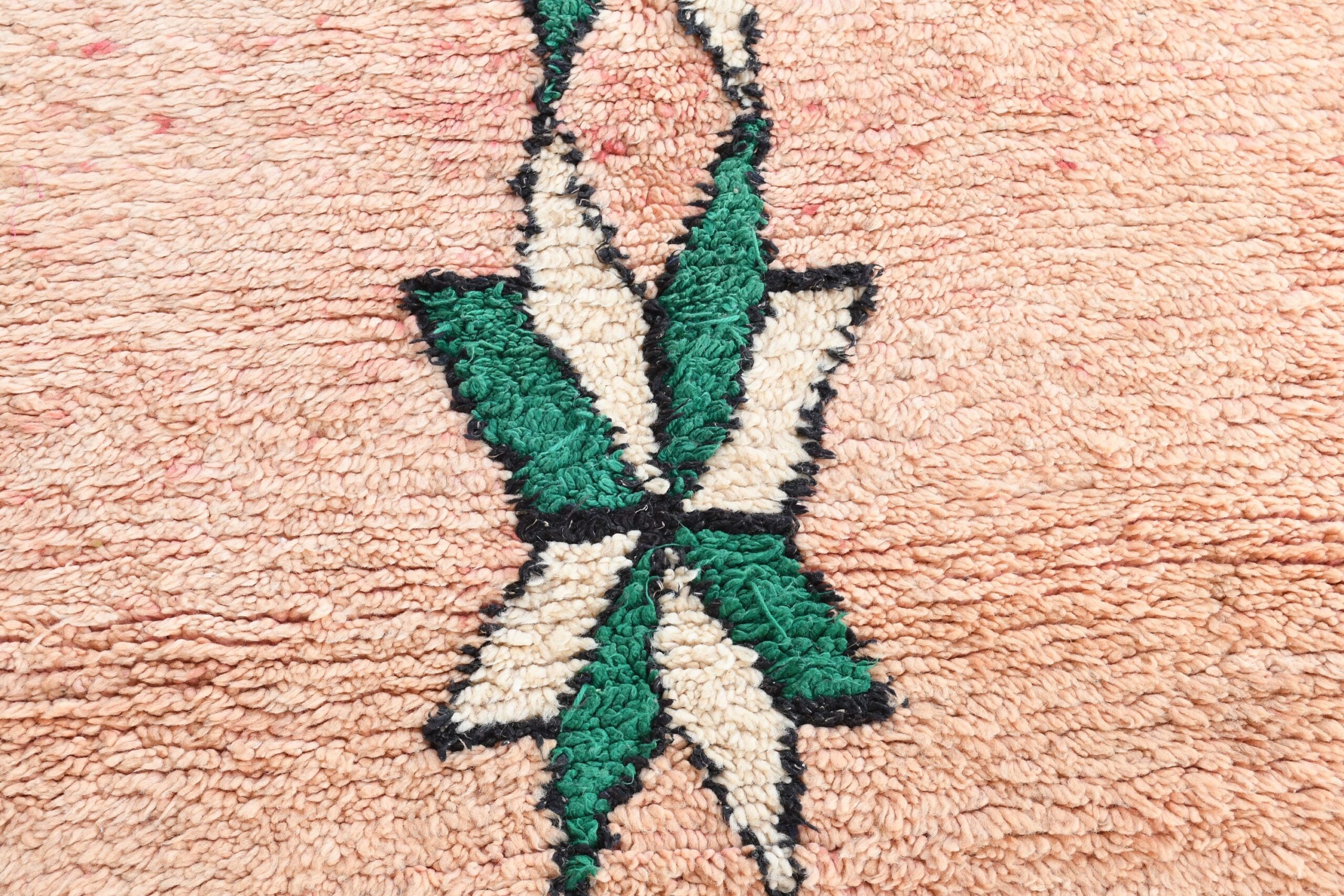 a rug with a green and white design. il_fullxfull.6017516362_agvr.jpg